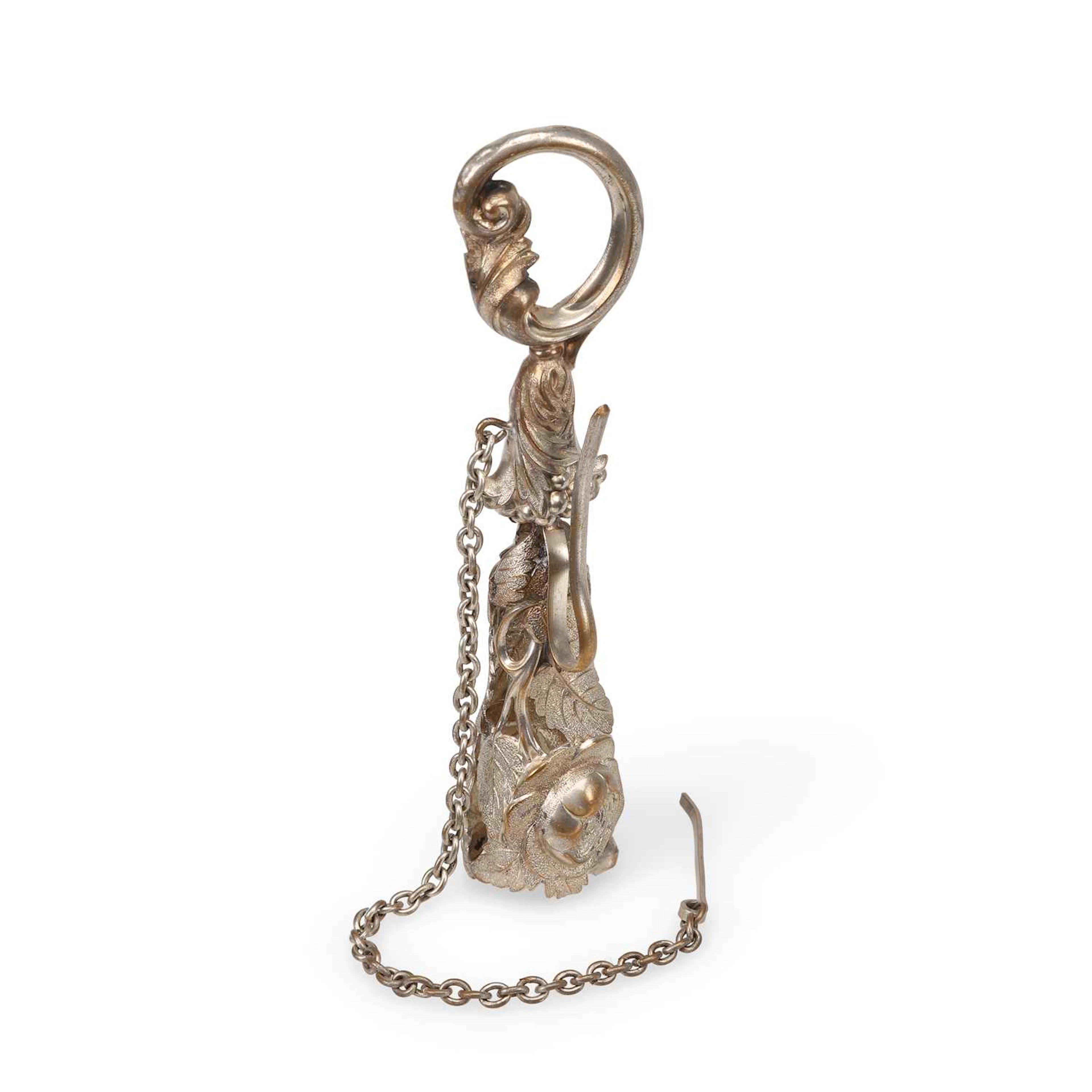A VICTORIAN SILVERED METAL POSY HOLDER