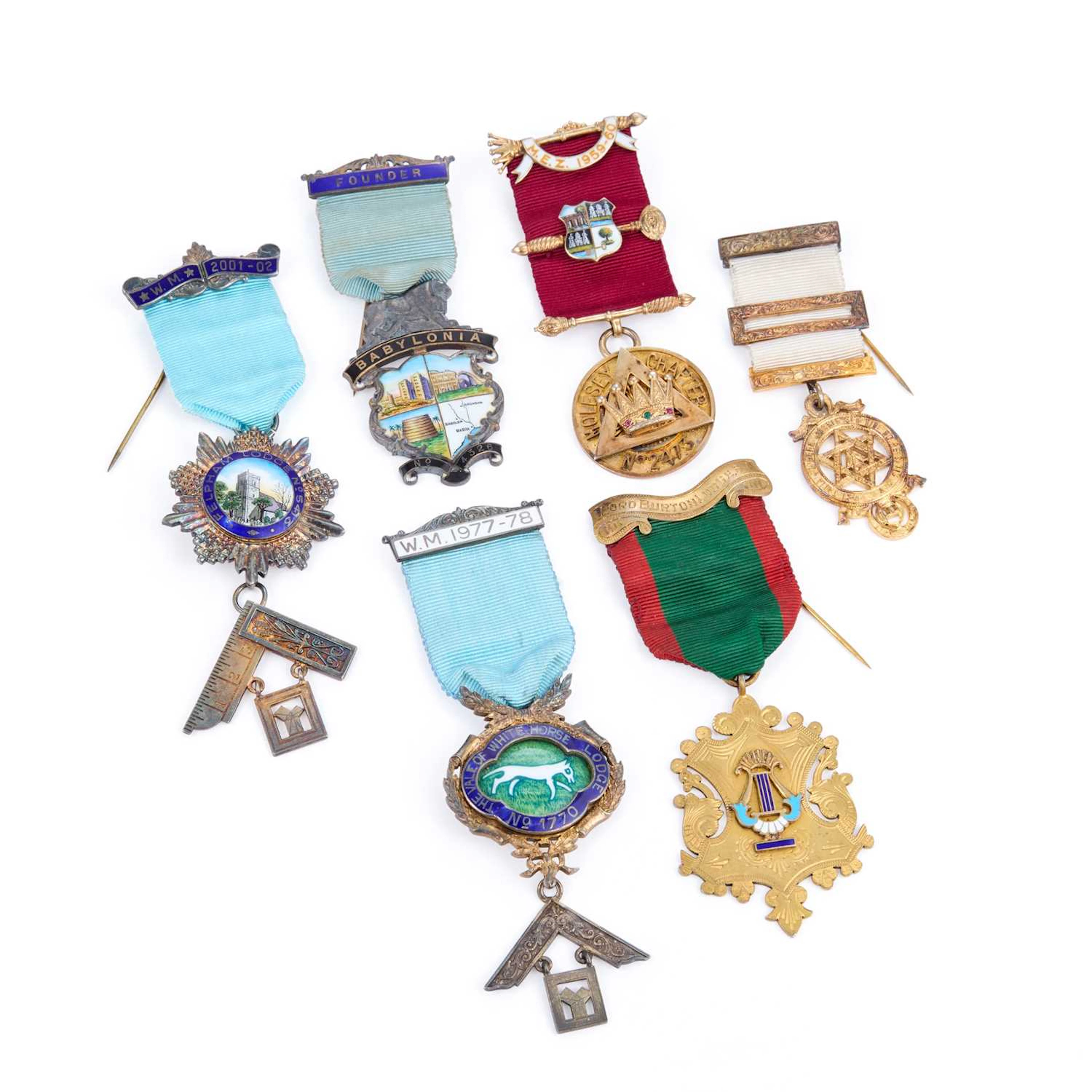 A GROUP OF SILVER MASONIC JEWELS