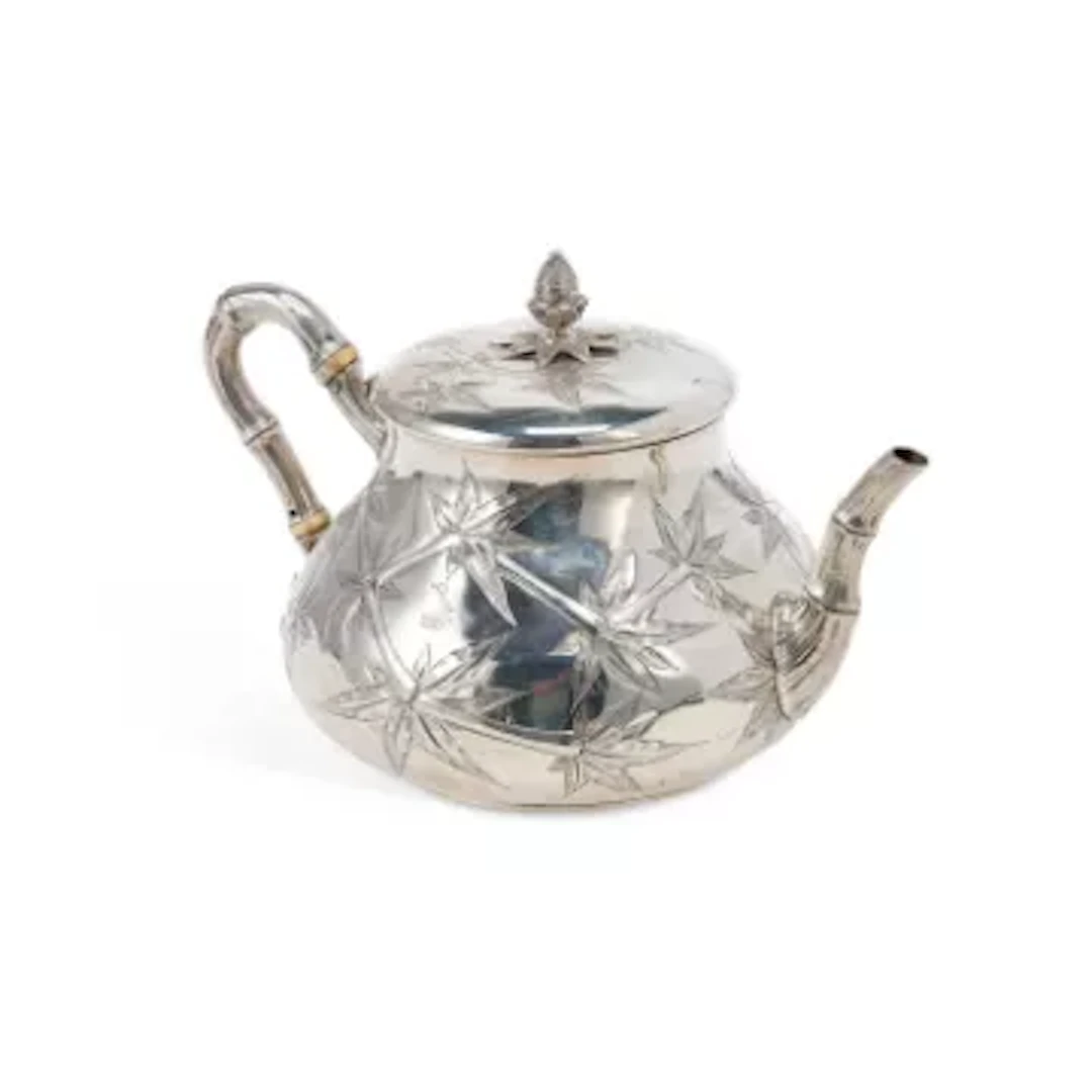 A VICTORIAN SILVER CHINOISERIE TEAPOT