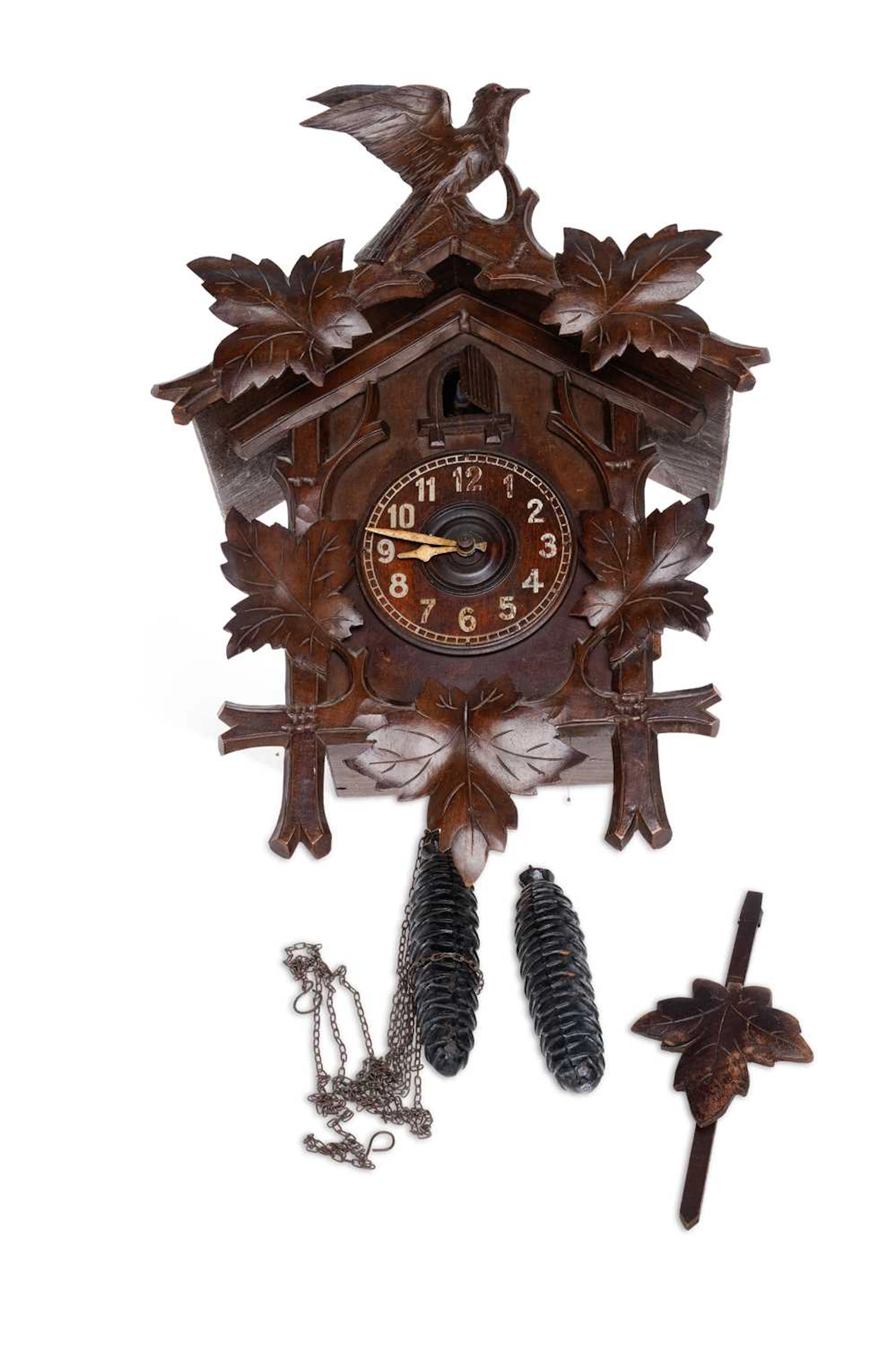 A LATE 19TH CENTURY BLACK FOREST CARVED CUCKOO CLOCK