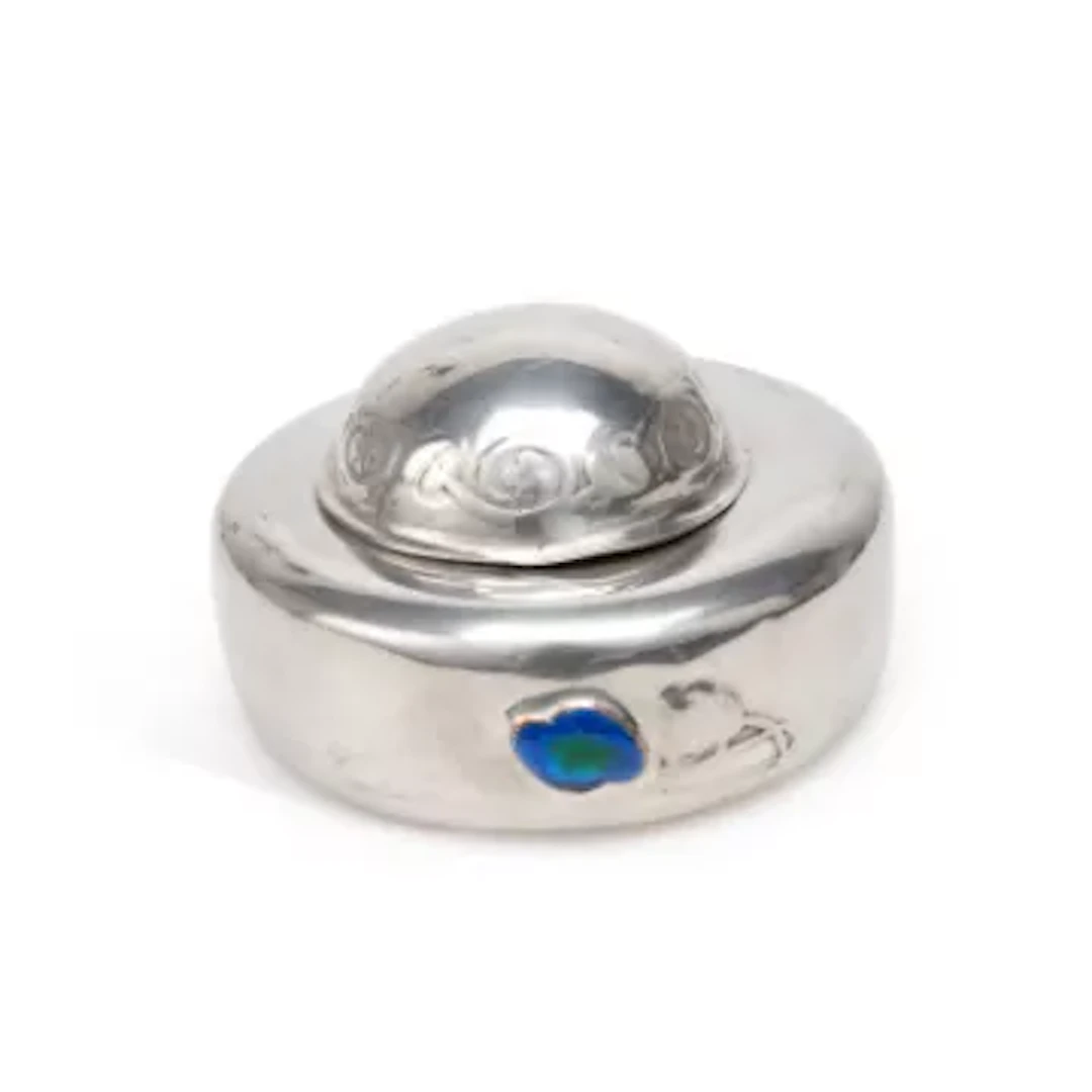 ARCHIBALD KNOX (1864-1933) FOR LIBERTY & CO A TUDRIC PEWTER AND ENAMEL INKWELL