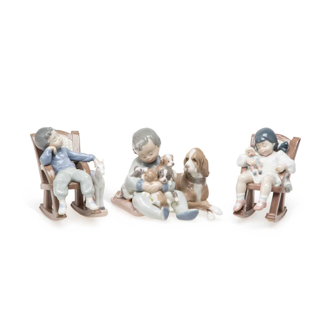 THREE LLADRÓ FIGURE GROUPS OF CHILDREN