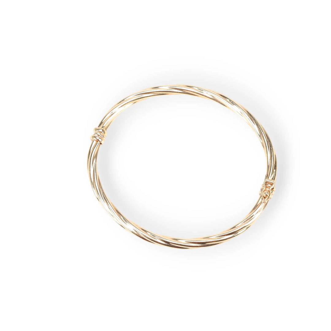 A HINGE OPENING BANGLE