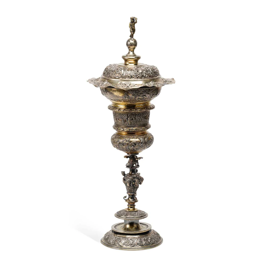A CONTINENTAL SILVER AND SILVER-GILT STANDING CUP AND COVER