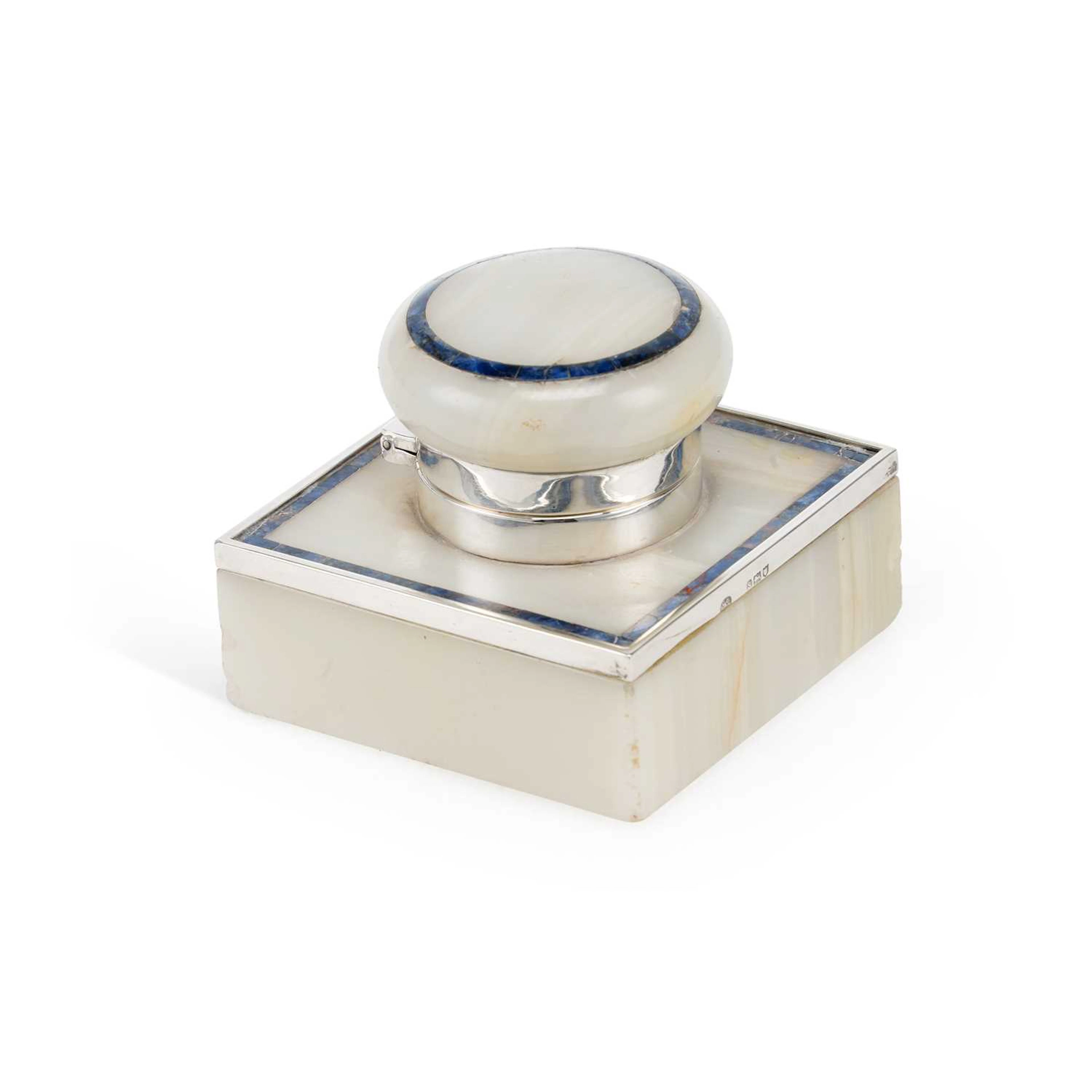 A GEORGE V ART DECO SILVER MOUNTED ONYX AND STONE INKWELL