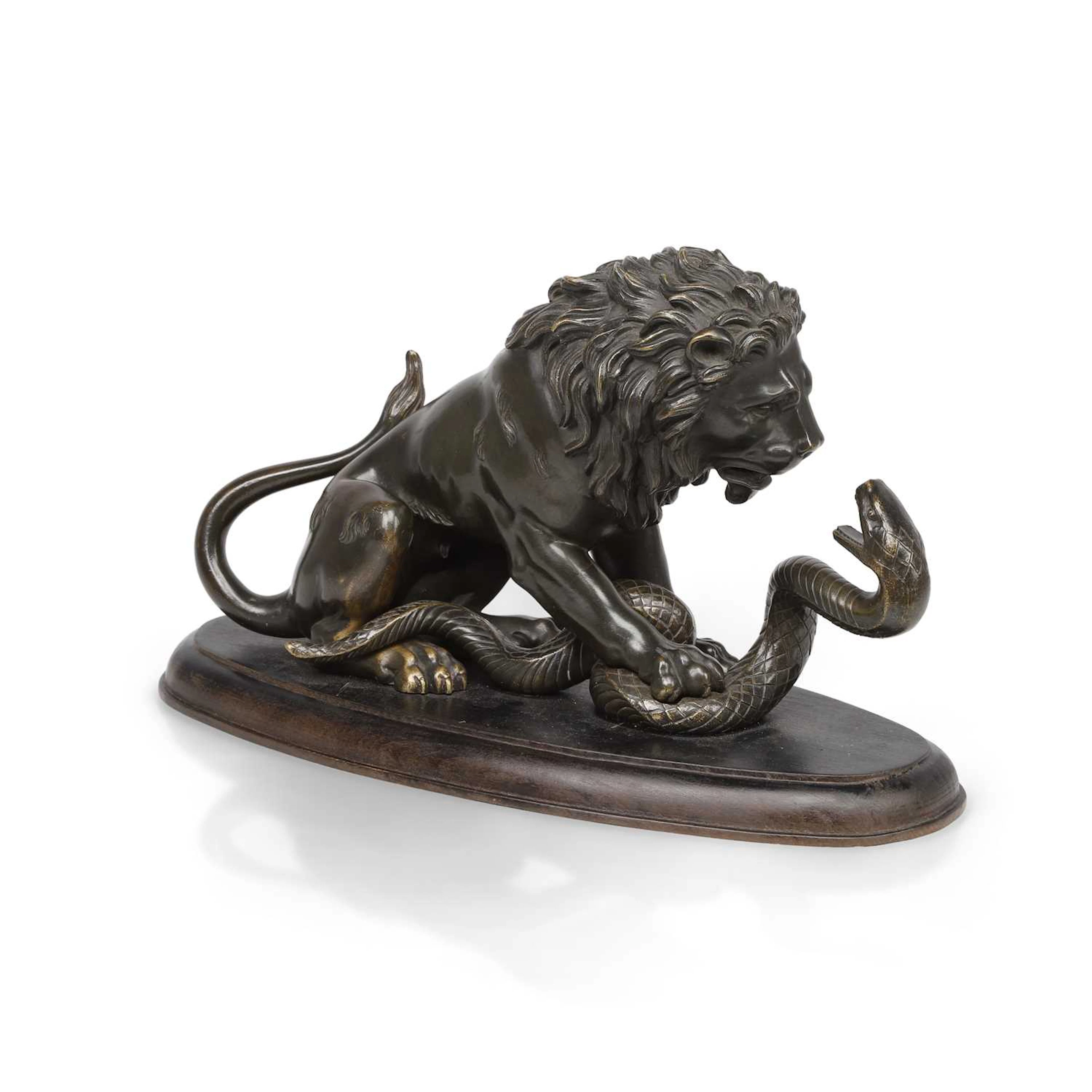 A BRONZE GROUP OF A LION AND A SERPENT