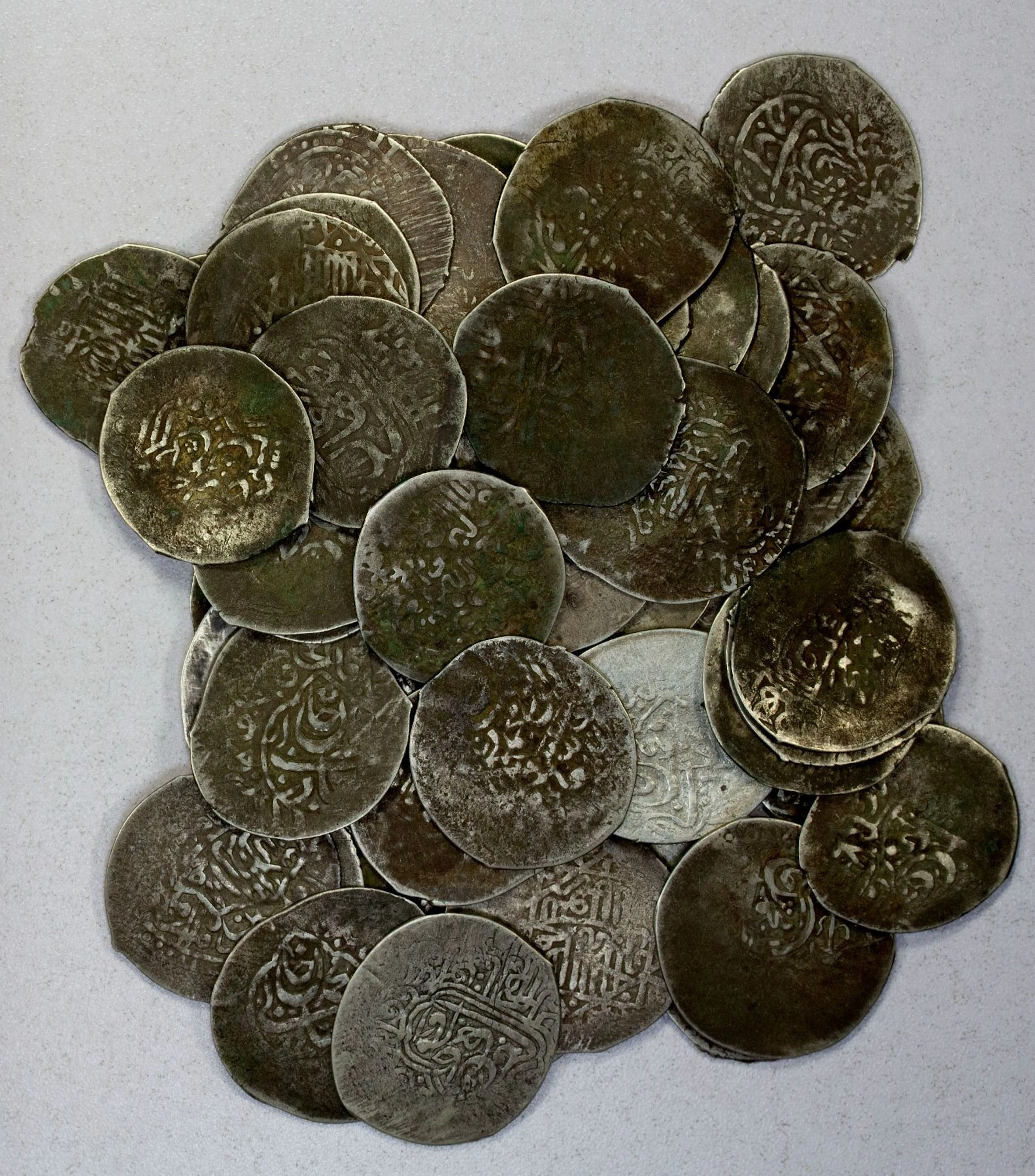 EARLY ISLAMIC: JANID: LOT of 63 silver tankas