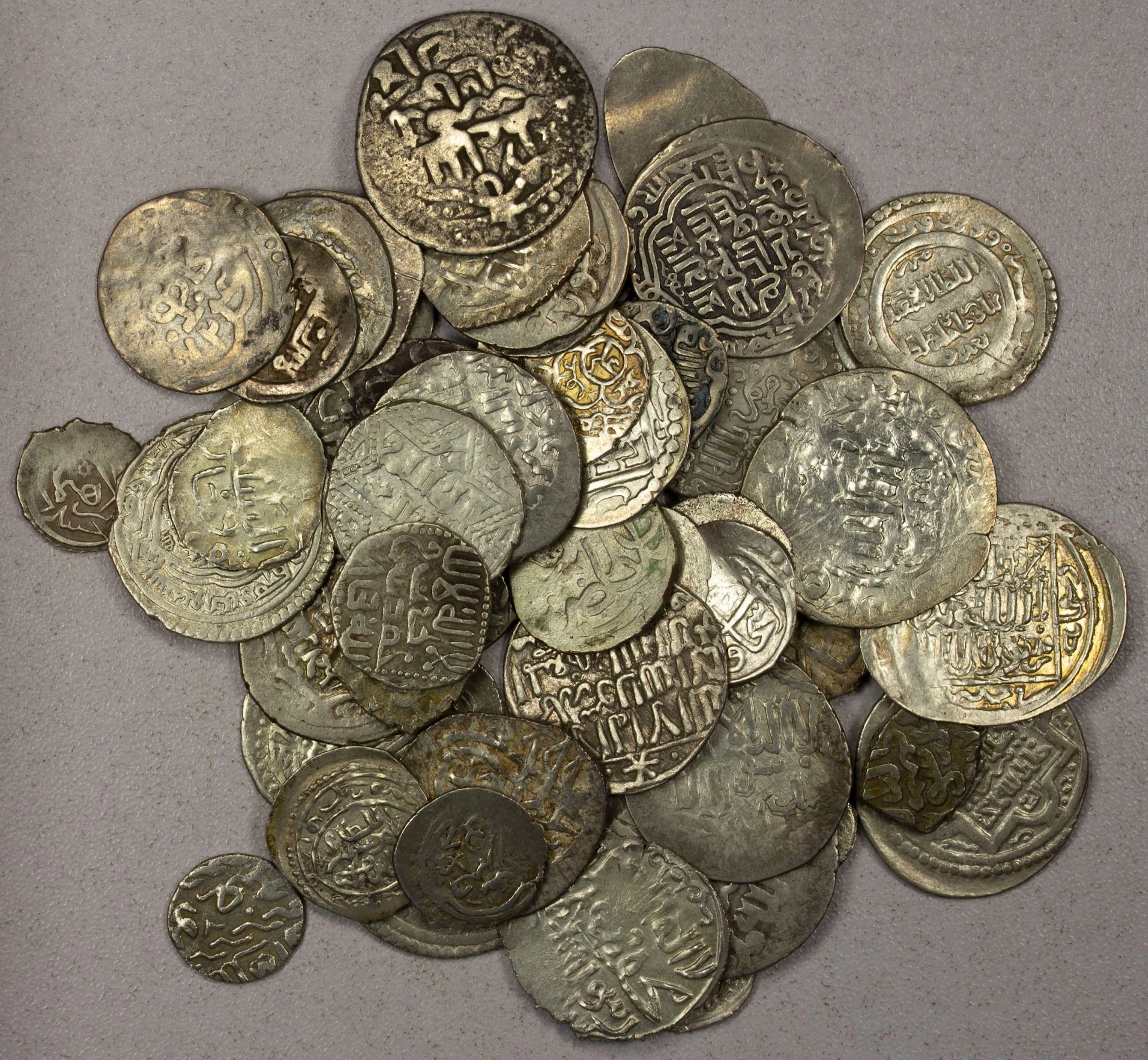 MEDIEVAL ISLAMIC: LOT of 56 silver coins