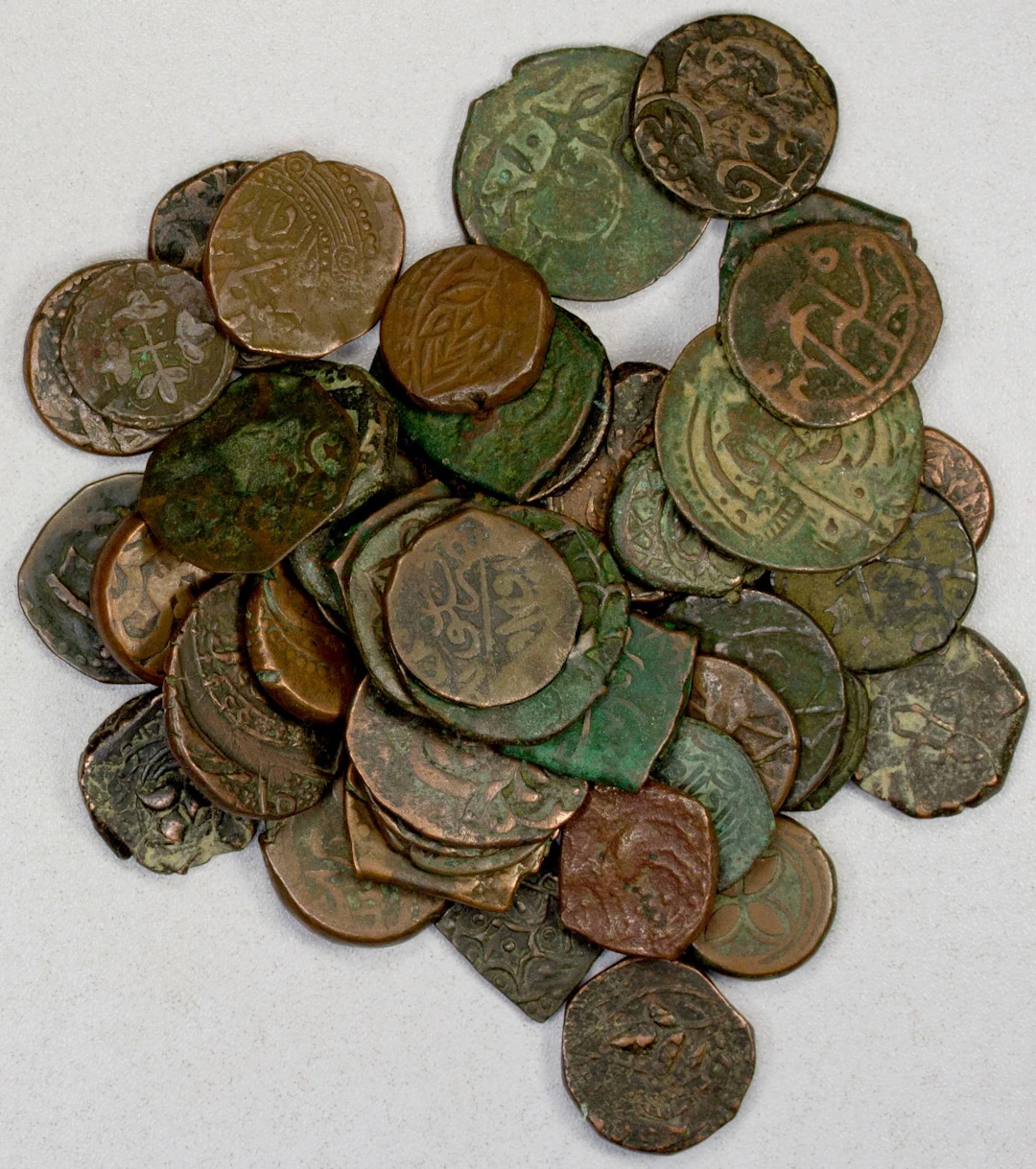 EARLY ISLAMIC: CIVIC COPPER: LOT of 49 copper fulus