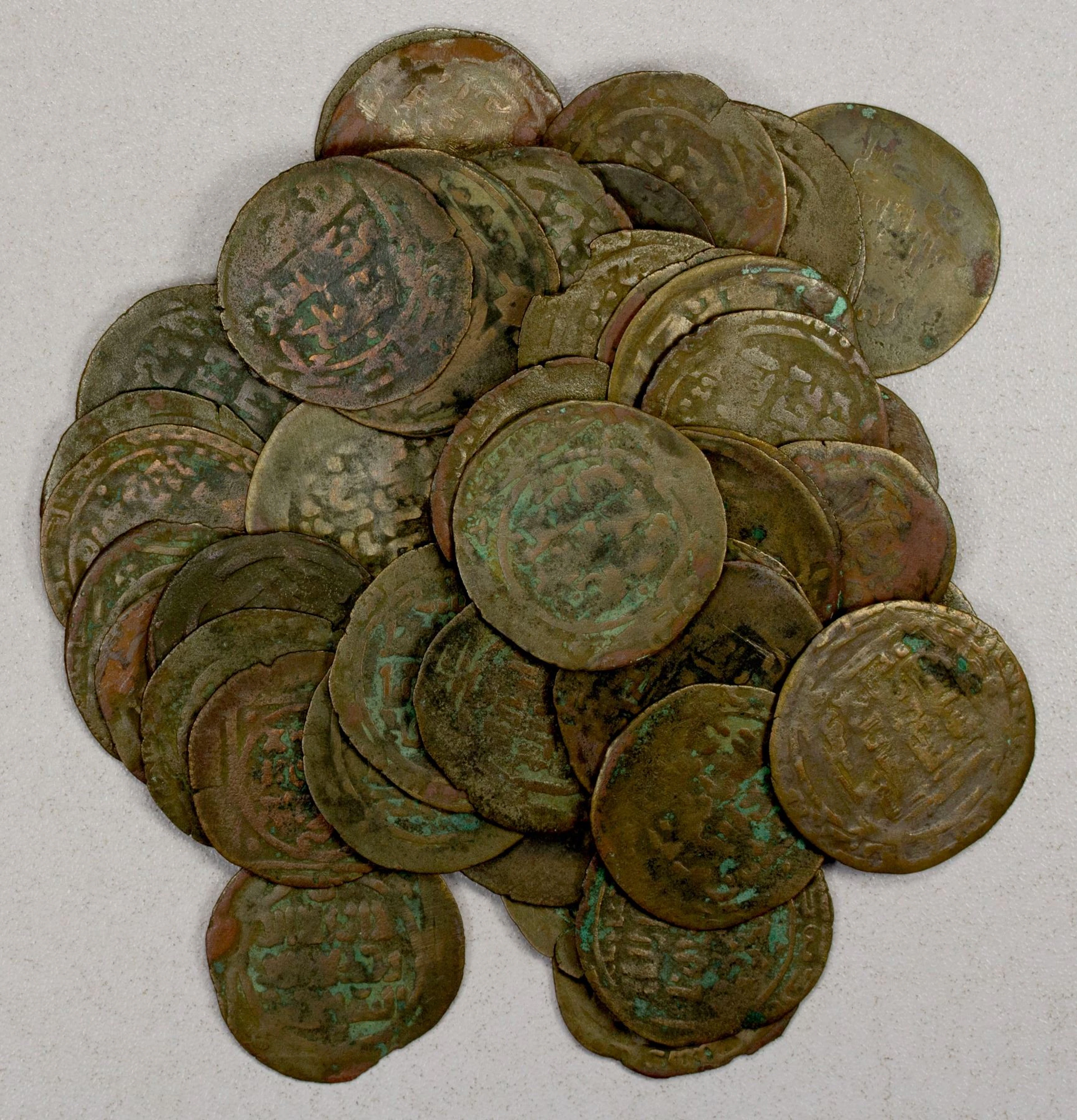 EARLY ISLAMIC: QARAKHANID: LOT of 56 middle size copper "dirhams"