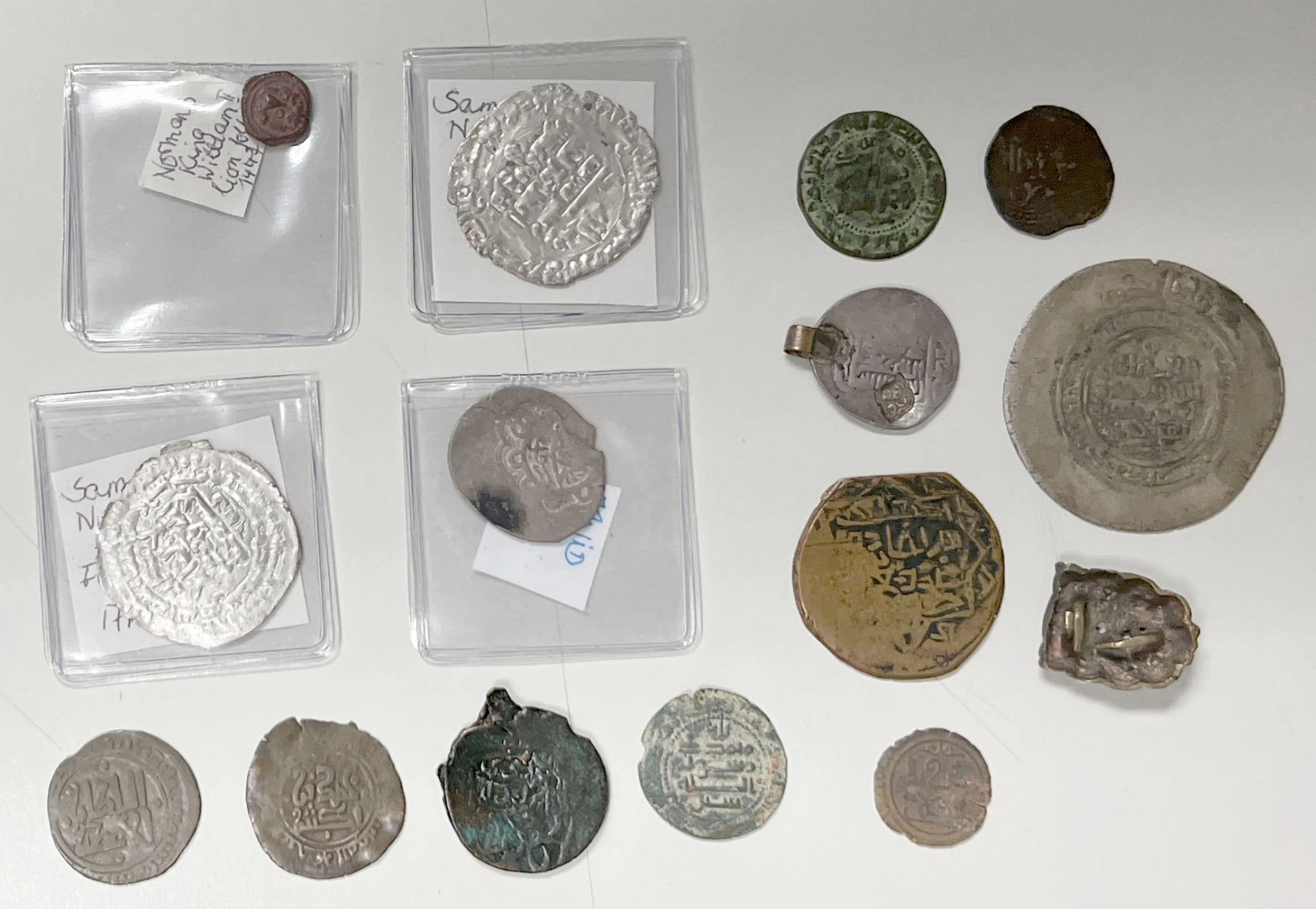 MEDIEVAL ISLAMIC: LOT of 13 coins and 1 decorative item