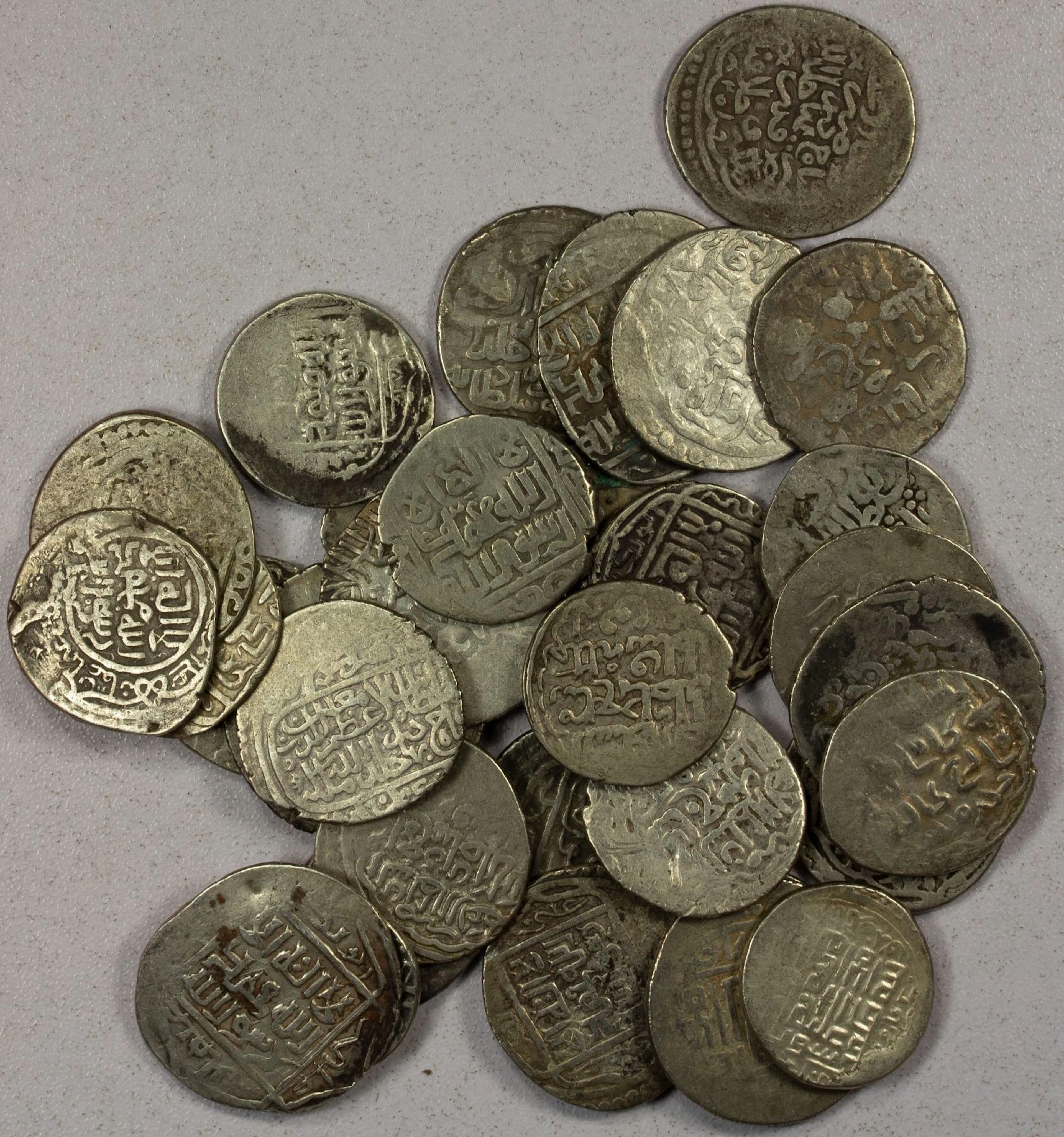 EARLY ISLAMIC: TIMURID: Shahrukh, 1405-1447, LOT of 33 silver tankas