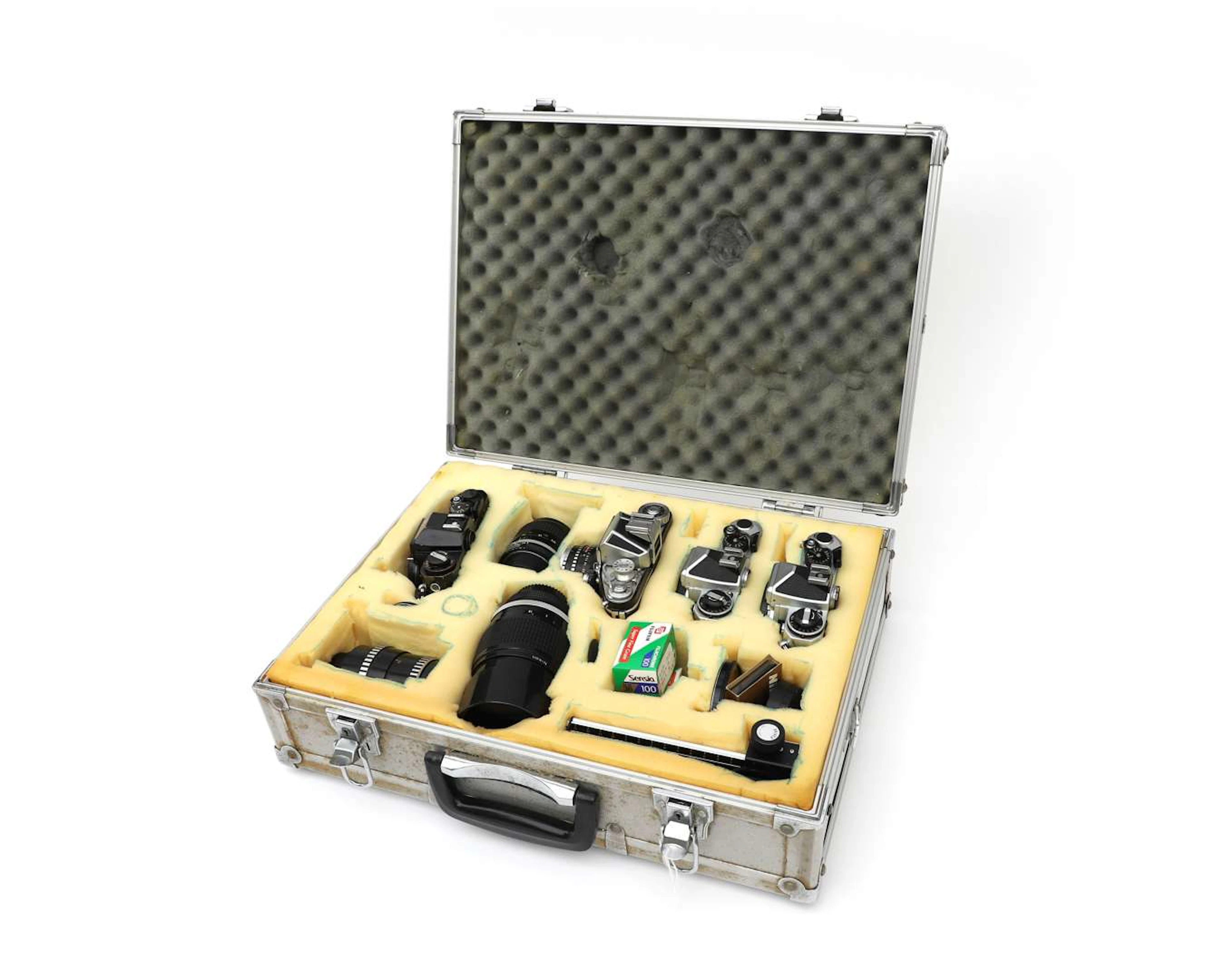 Nikon FE 35mm camera set in a metal case