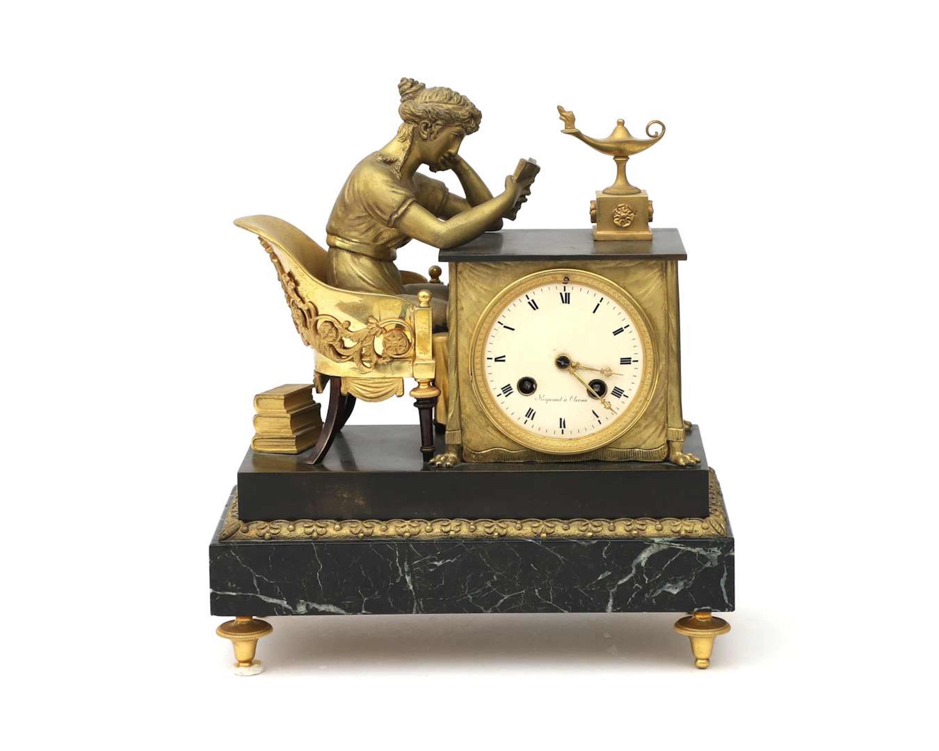 A bronze empire mantel clock 'La liseuse', after design by Jean-Andre