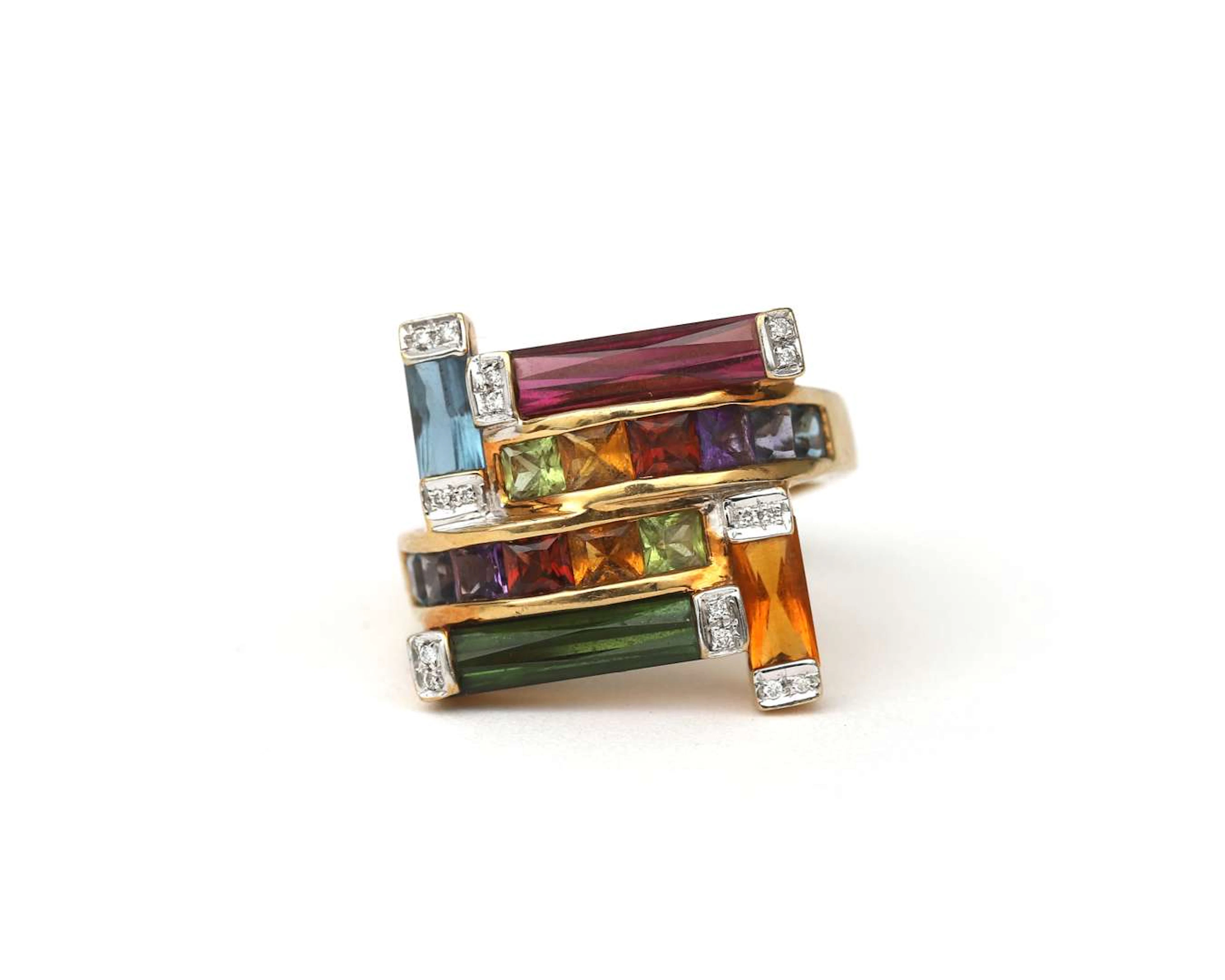 An 18k yellow gold Bellarri ring set with various gemstones and a diamond