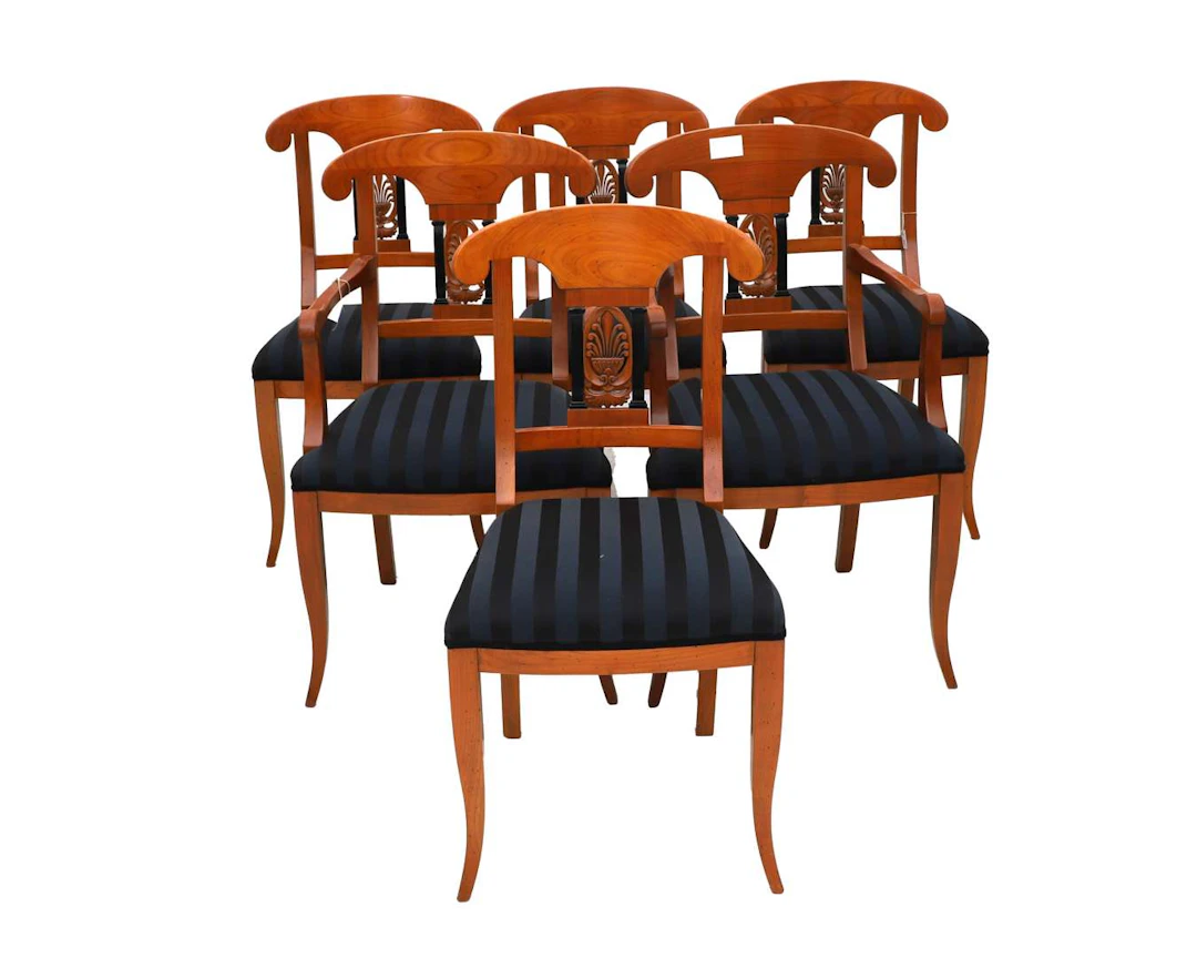 Four dining chairs and two armchairs with openwork backs. 20th/21st century