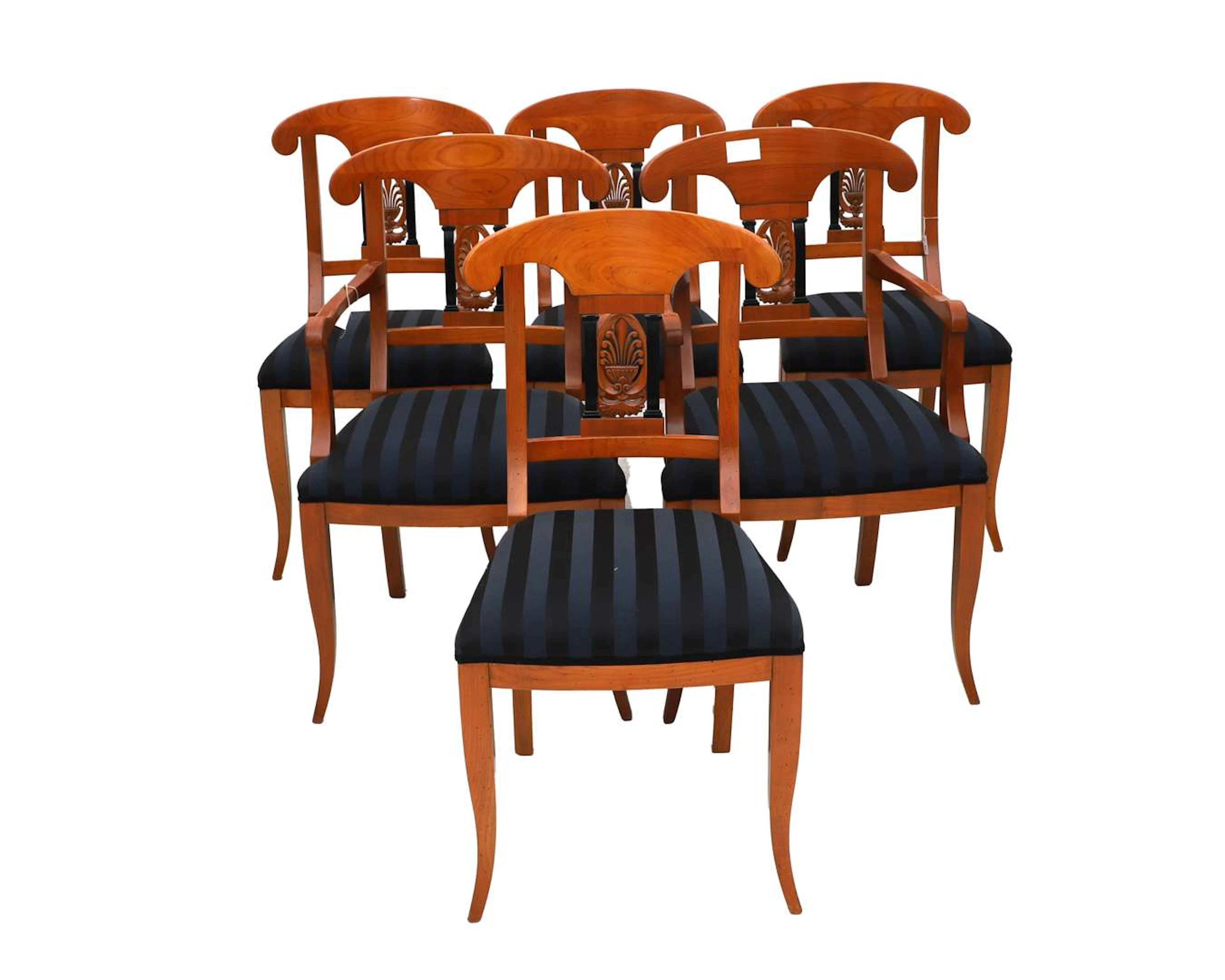 Four dining chairs and two armchairs with openwork backs. 20th/21st century