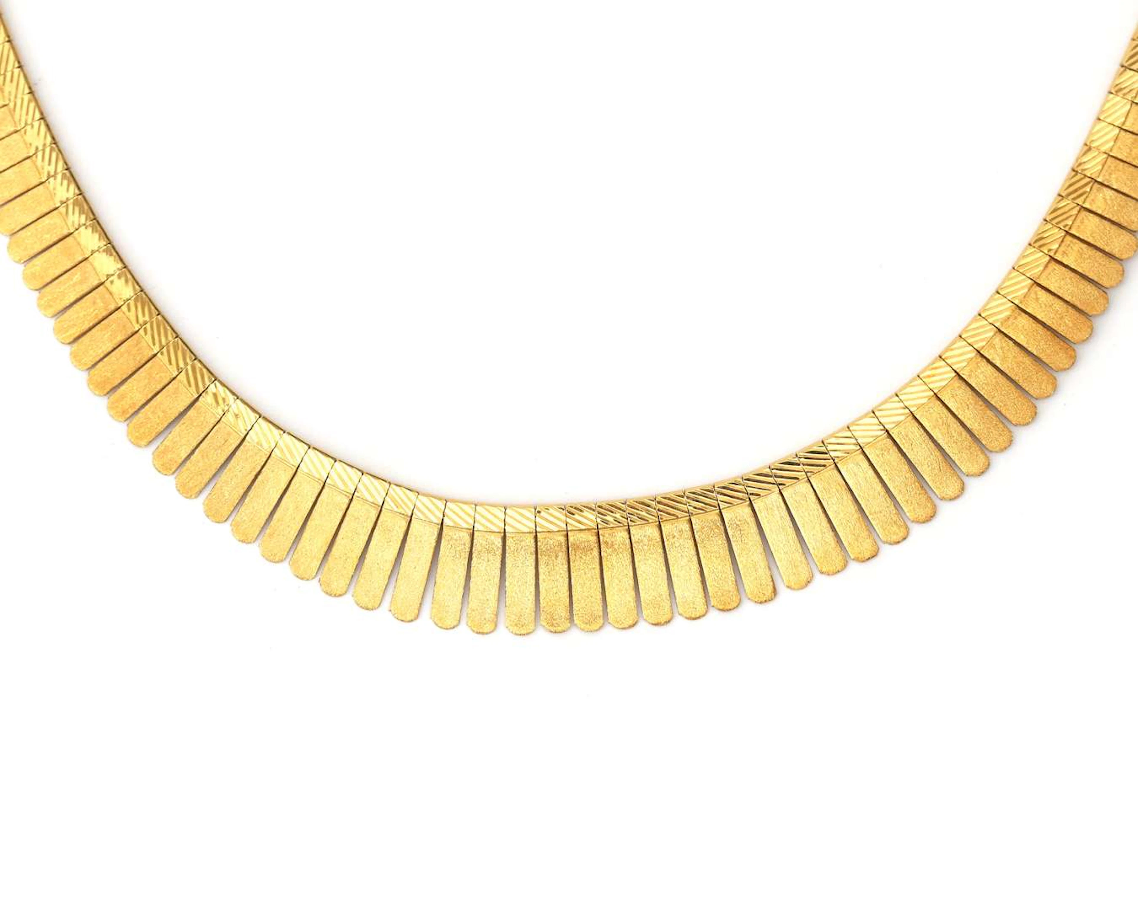 An 18k yellow gold Cleopatra necklace, 1960s–1970s