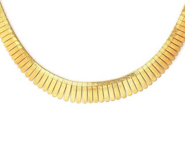 An 18k yellow gold Cleopatra necklace, 1960s–1970s