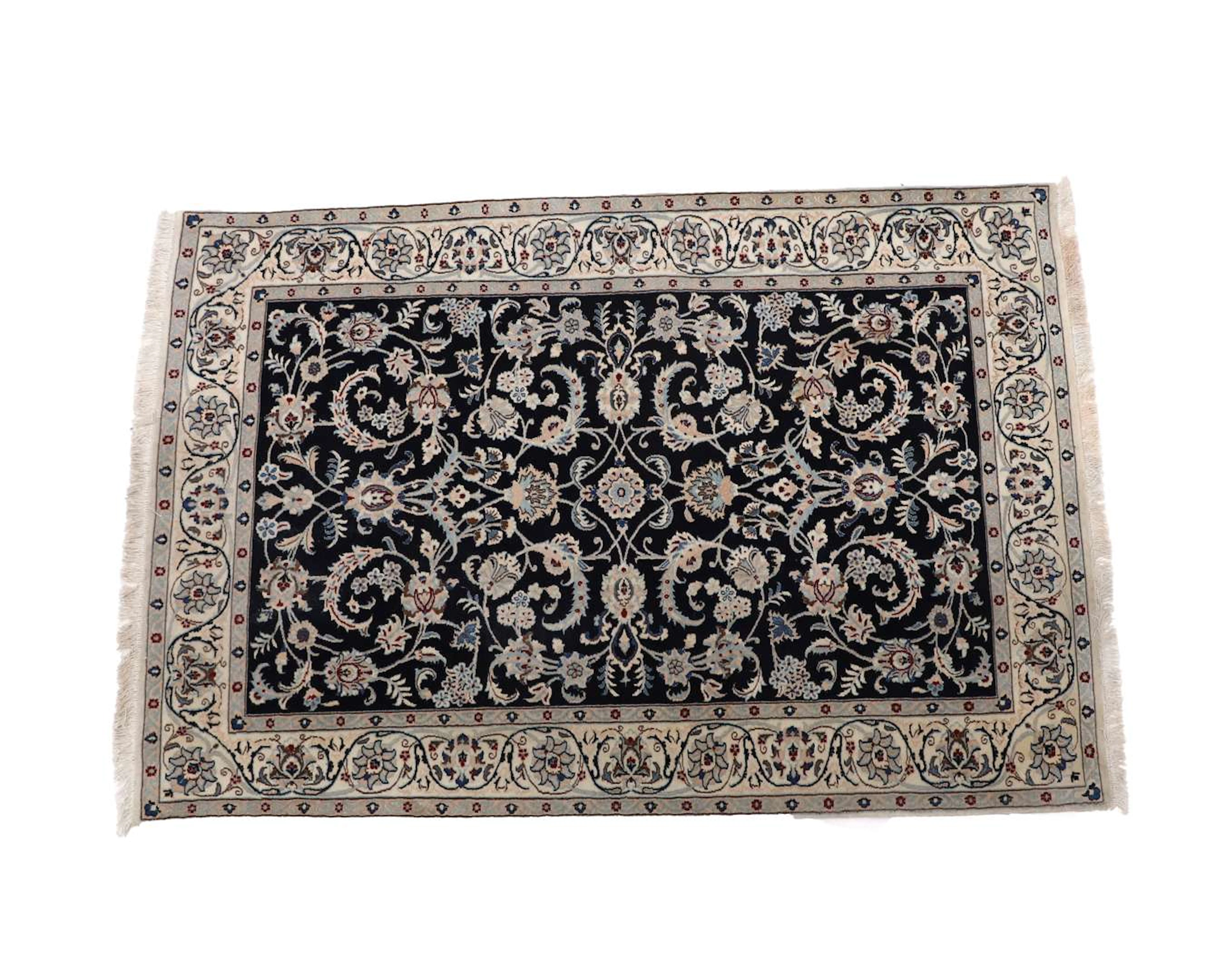 An Oriental carpet, Nain, 20th/21st century, dimensions 153 x 102 cm