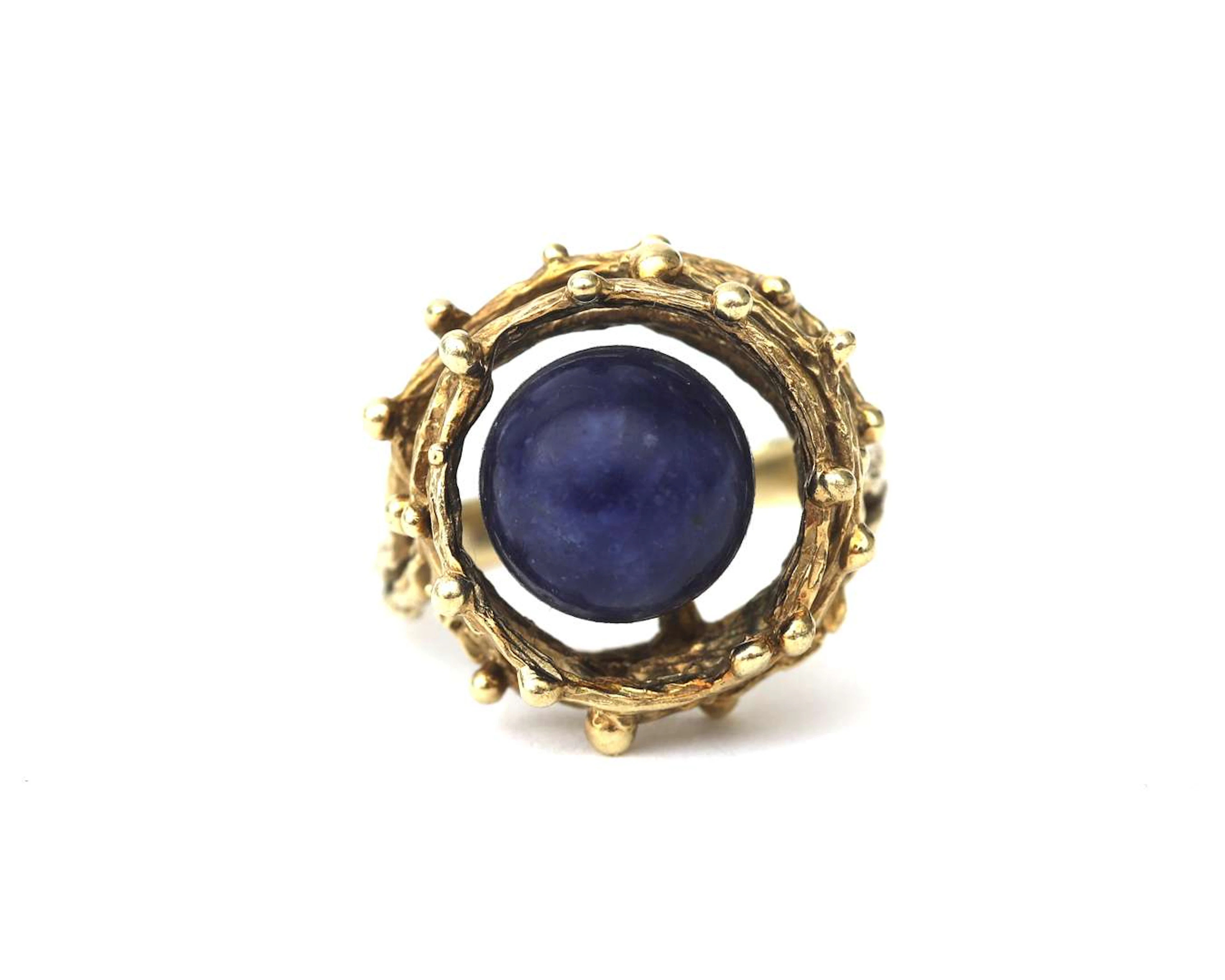 A 14K yellow gold anthroposophical ring with calcite