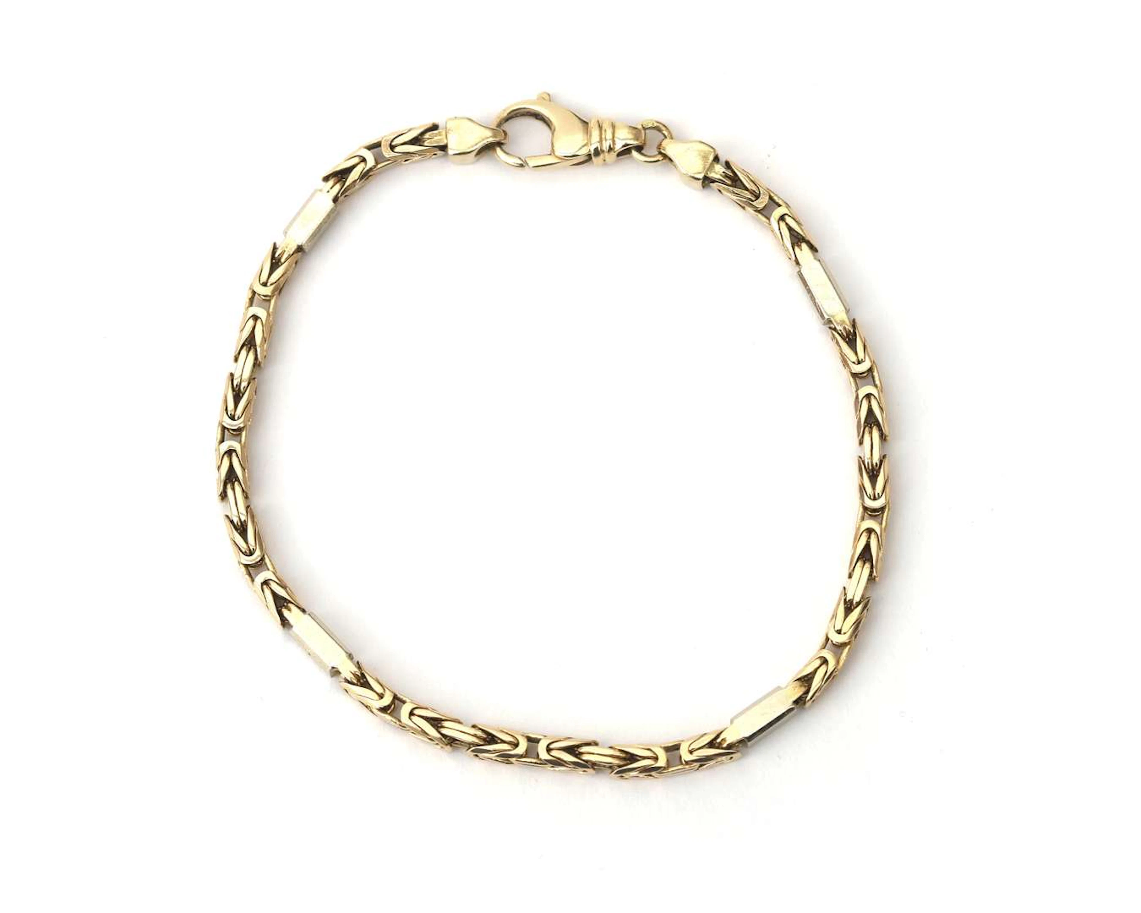 A 14-carat two-tone gold king’s chain bracelet