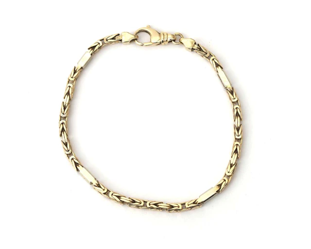 A 14-carat two-tone gold king’s chain bracelet