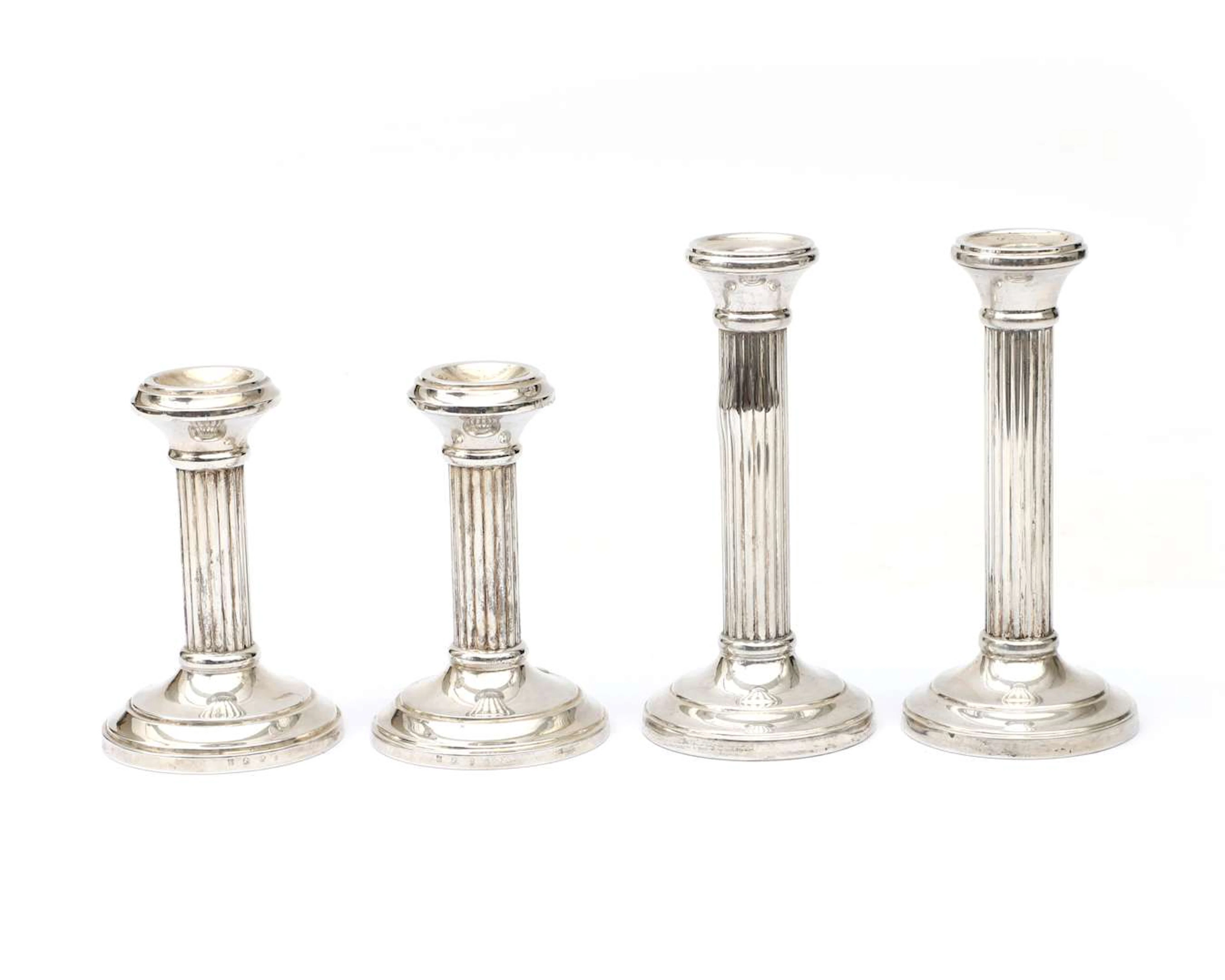 Four silver candlesticks, the Netherlands, 2007 and 2013