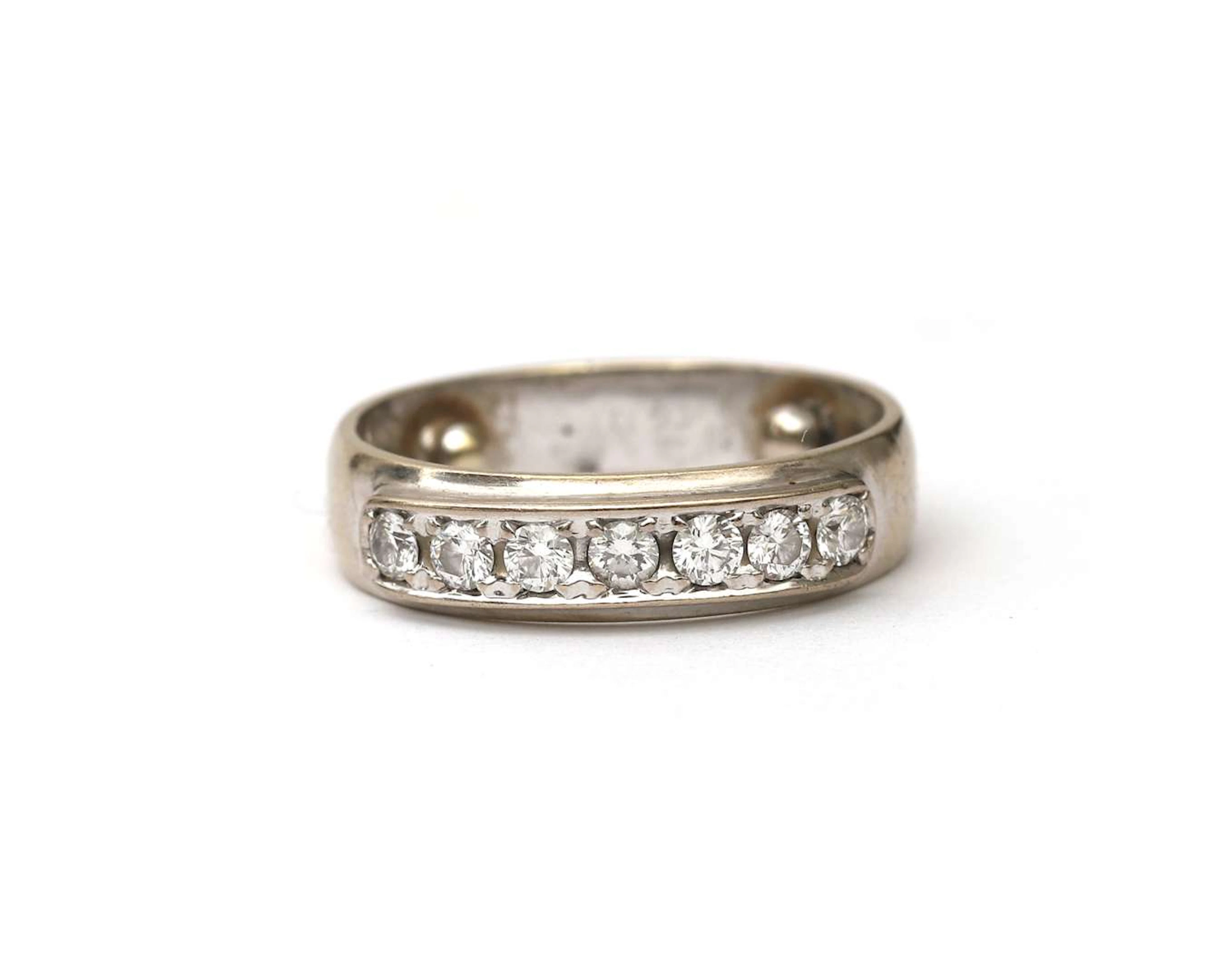 A 14k white gold ring with diamonds