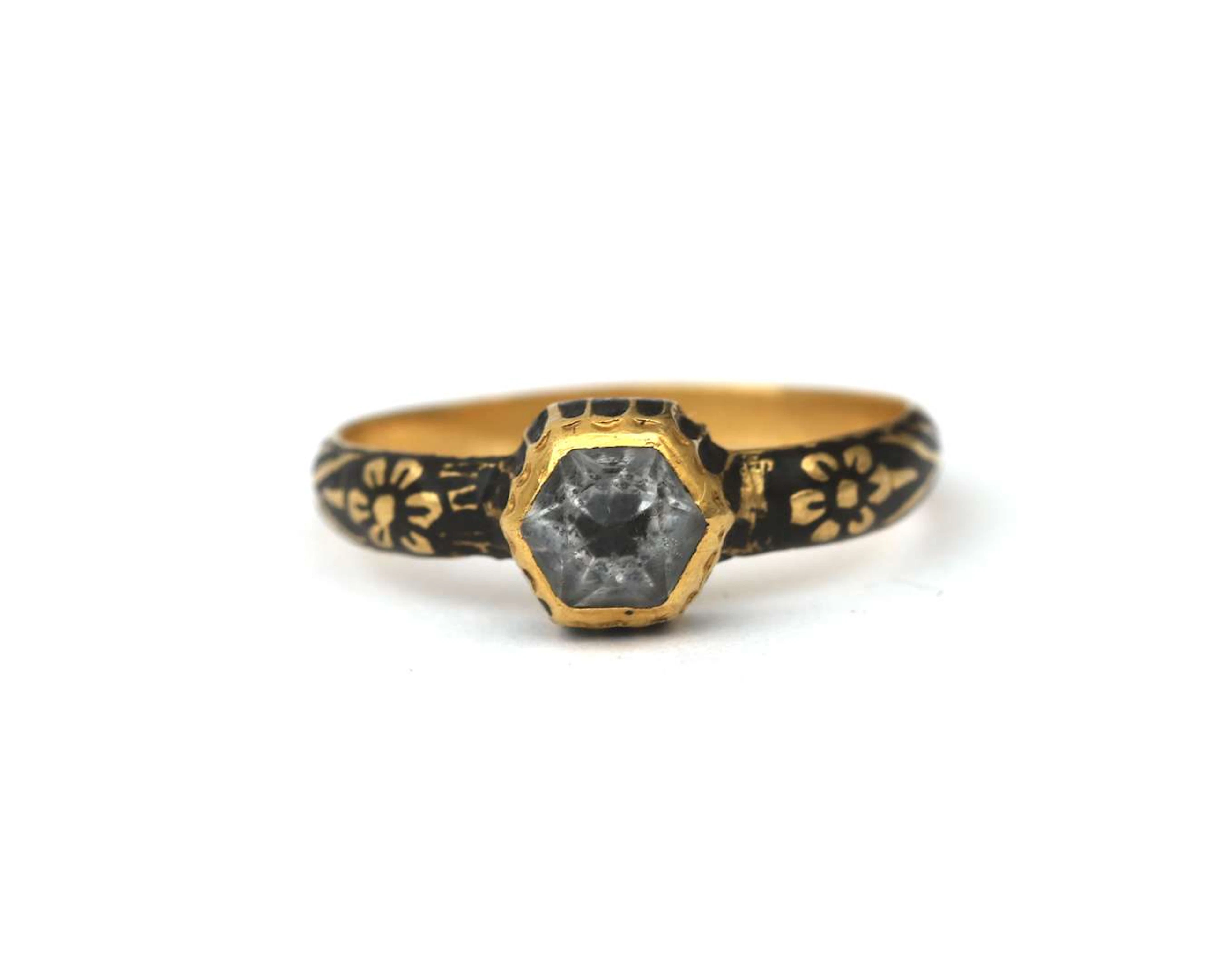 A yellow-gold Neo-Renaissance ring with black enamel and rock crystal