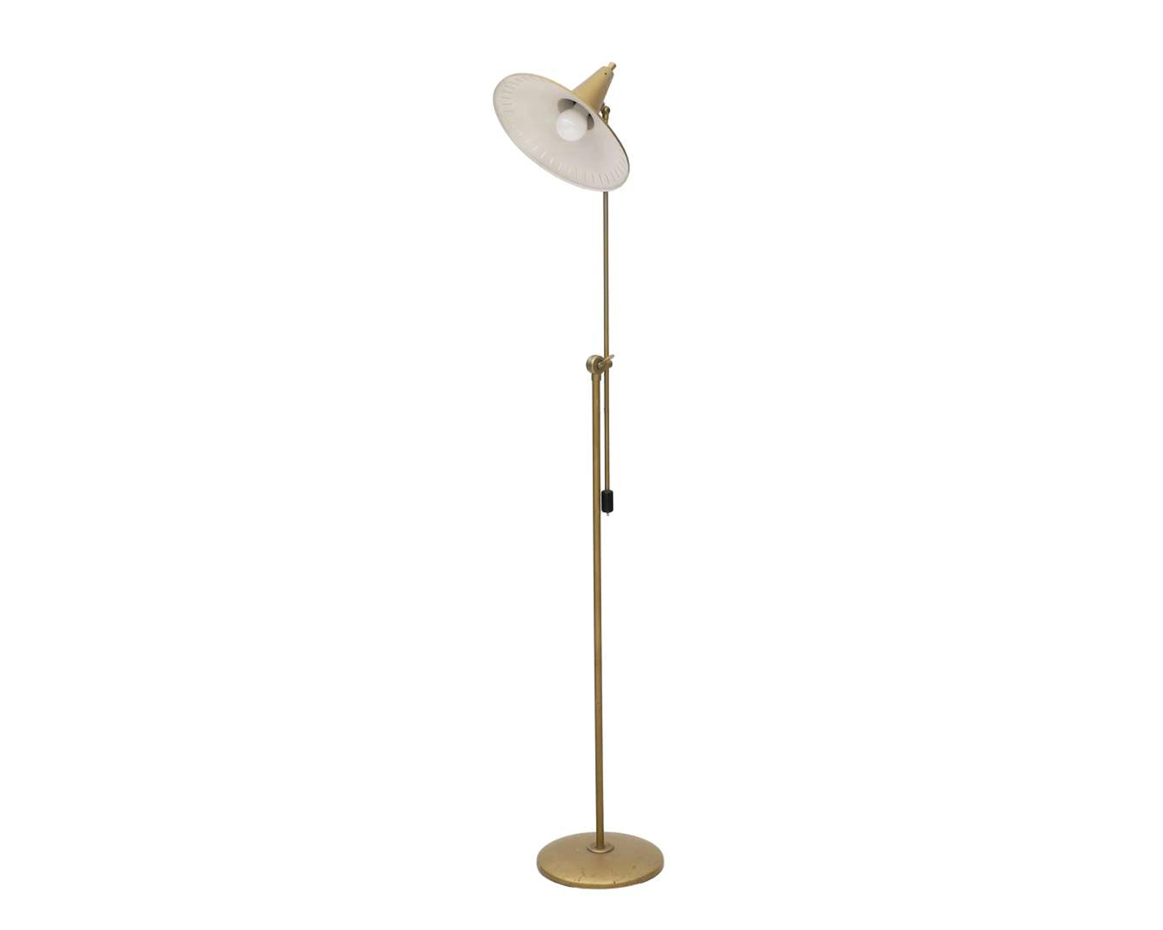 A gold-coloured floor lamp, Van Doorn, Culemborg, the Netherlands