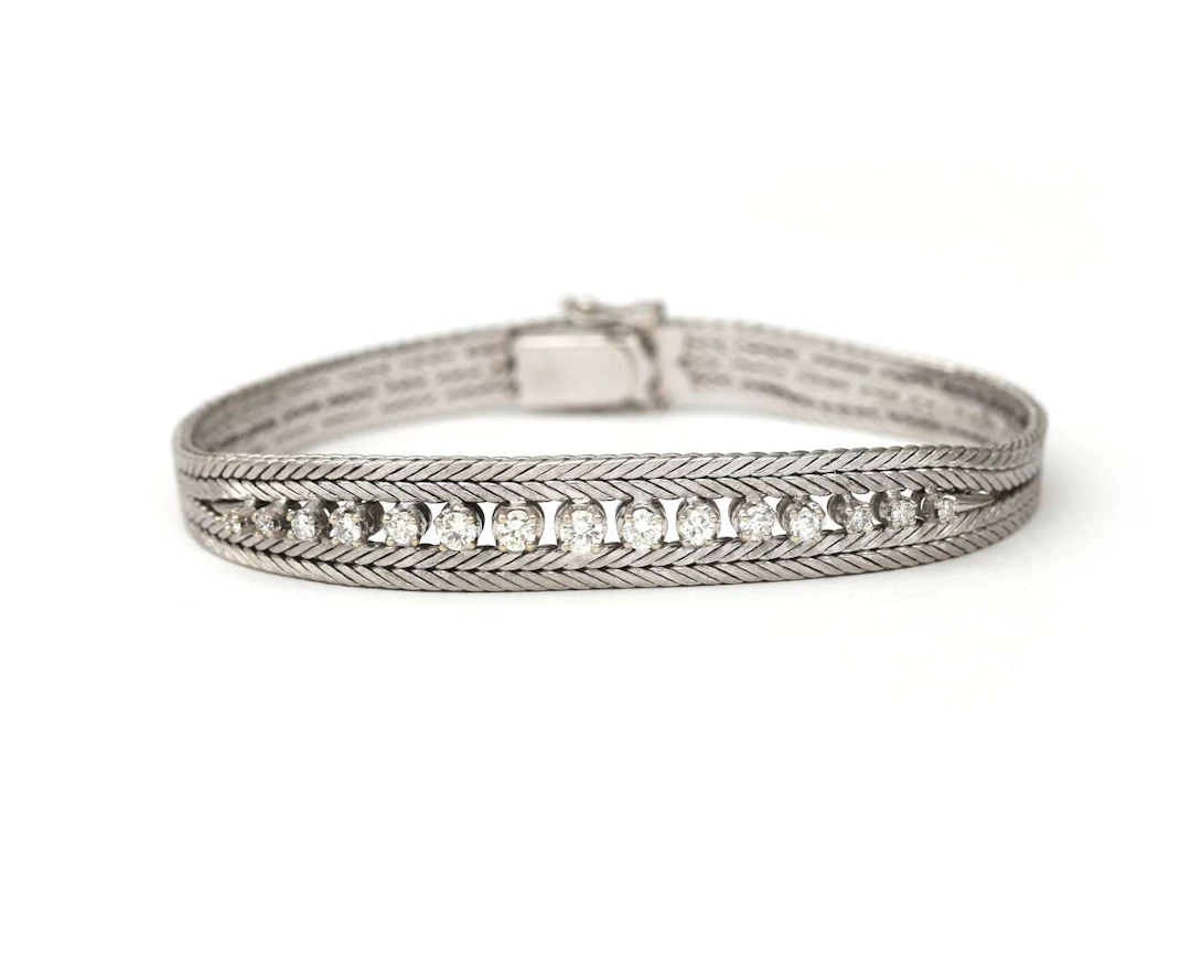 An 18k white gold bracelet with a diamond, from the 1970s