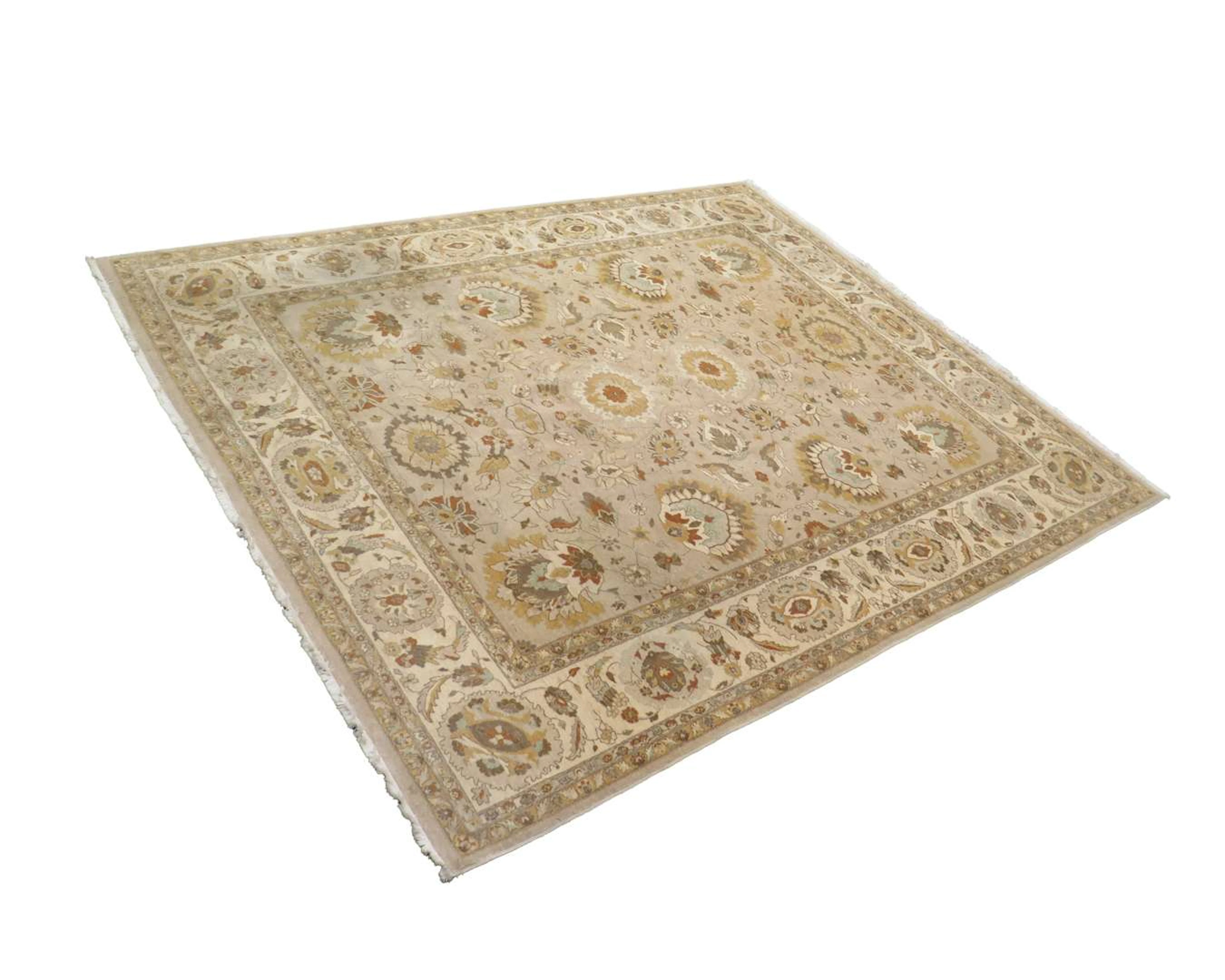 An Oriental carpet, 245 x 310 cm.