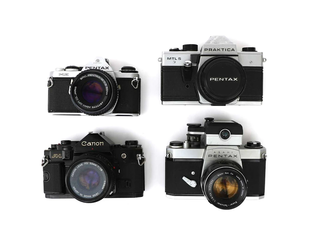 Four cameras from brands including Canon, Pentax and Praktica