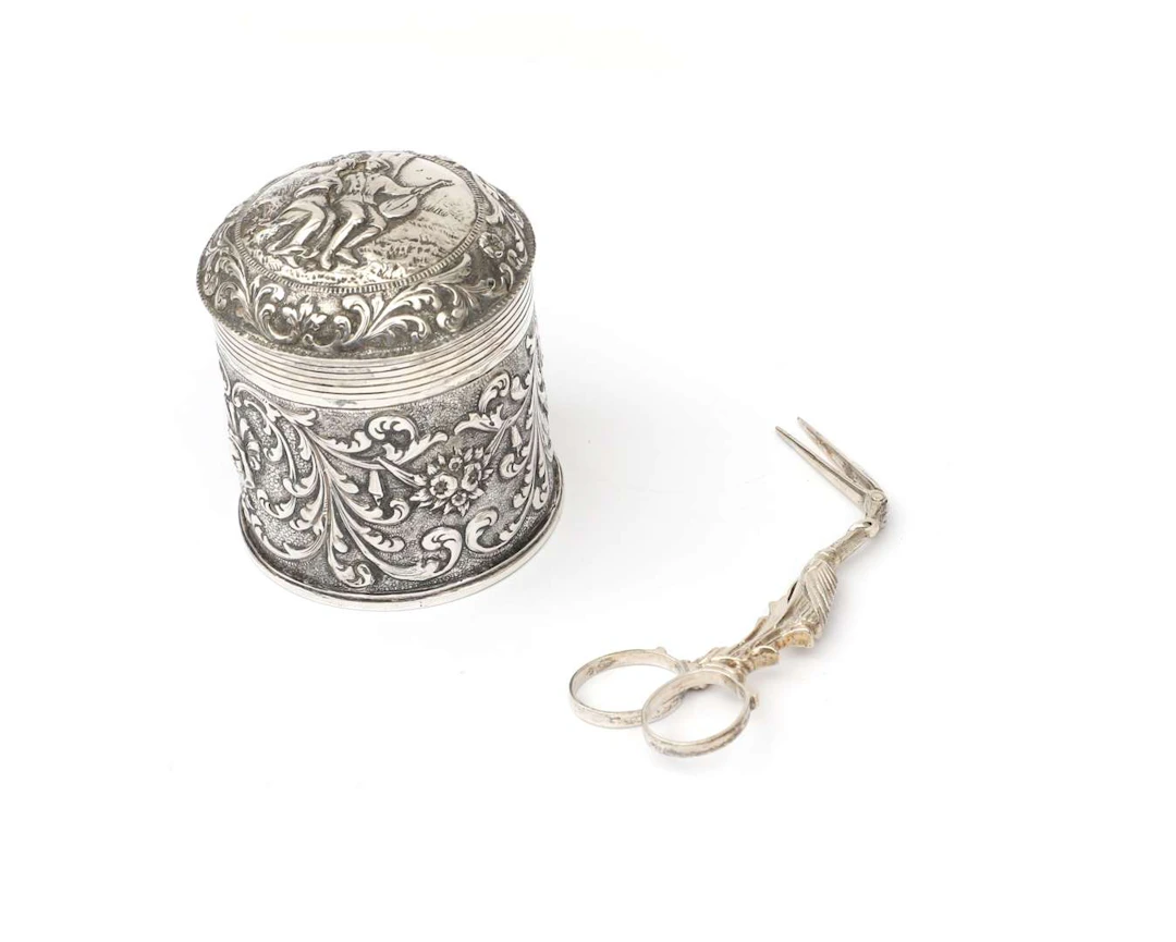 A silver nappy tongs and tea caddy, Netherlands, Leeuwarden, 19th/20th century