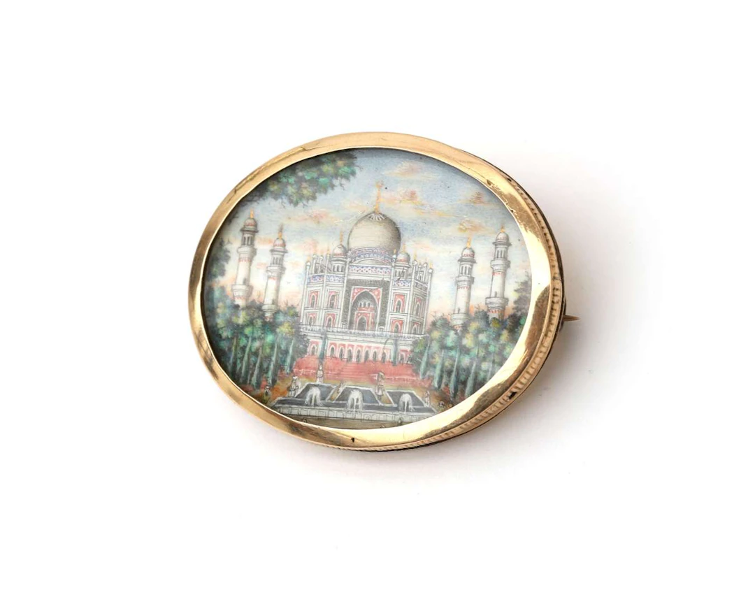 A 14k yellow gold and silver brooch