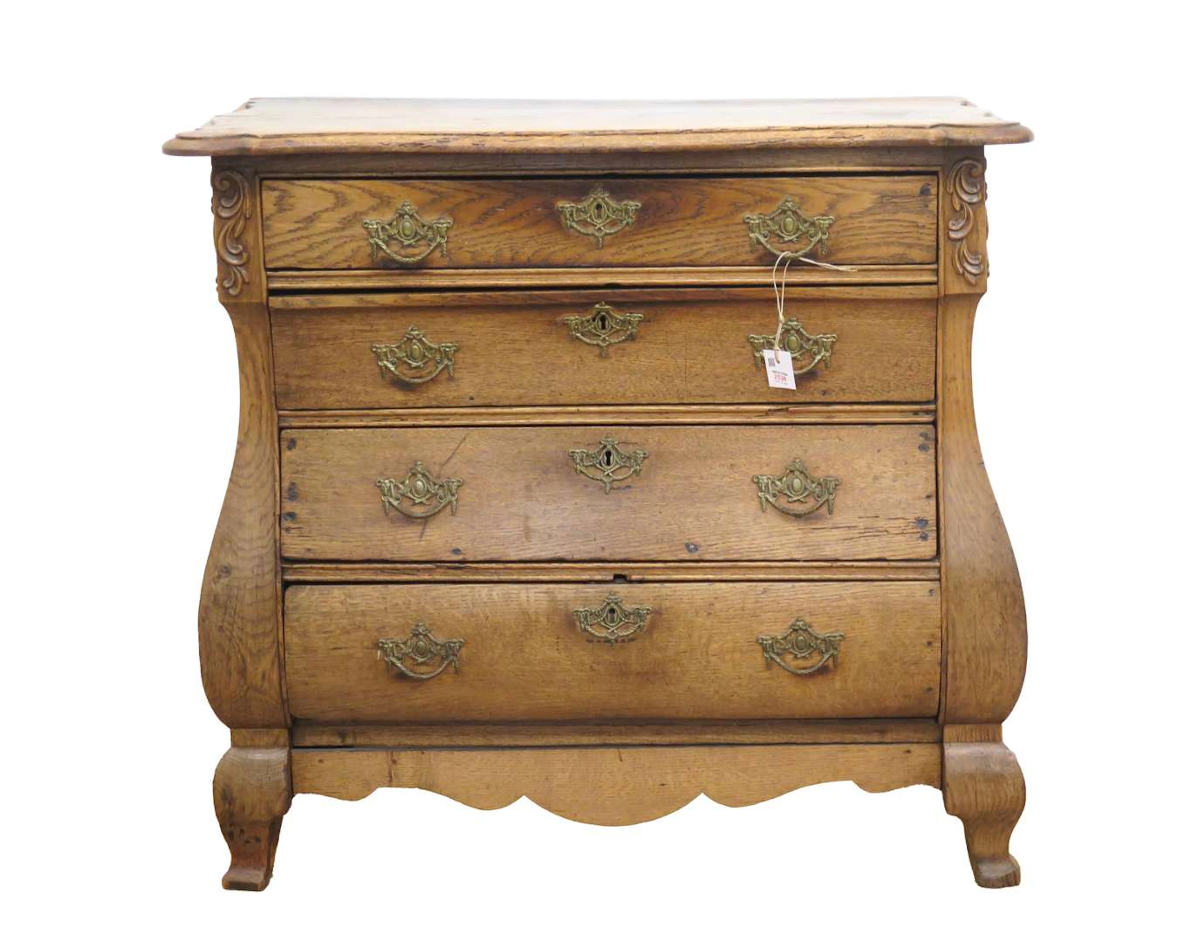 An oak chest of drawers with four drawers. 19th century