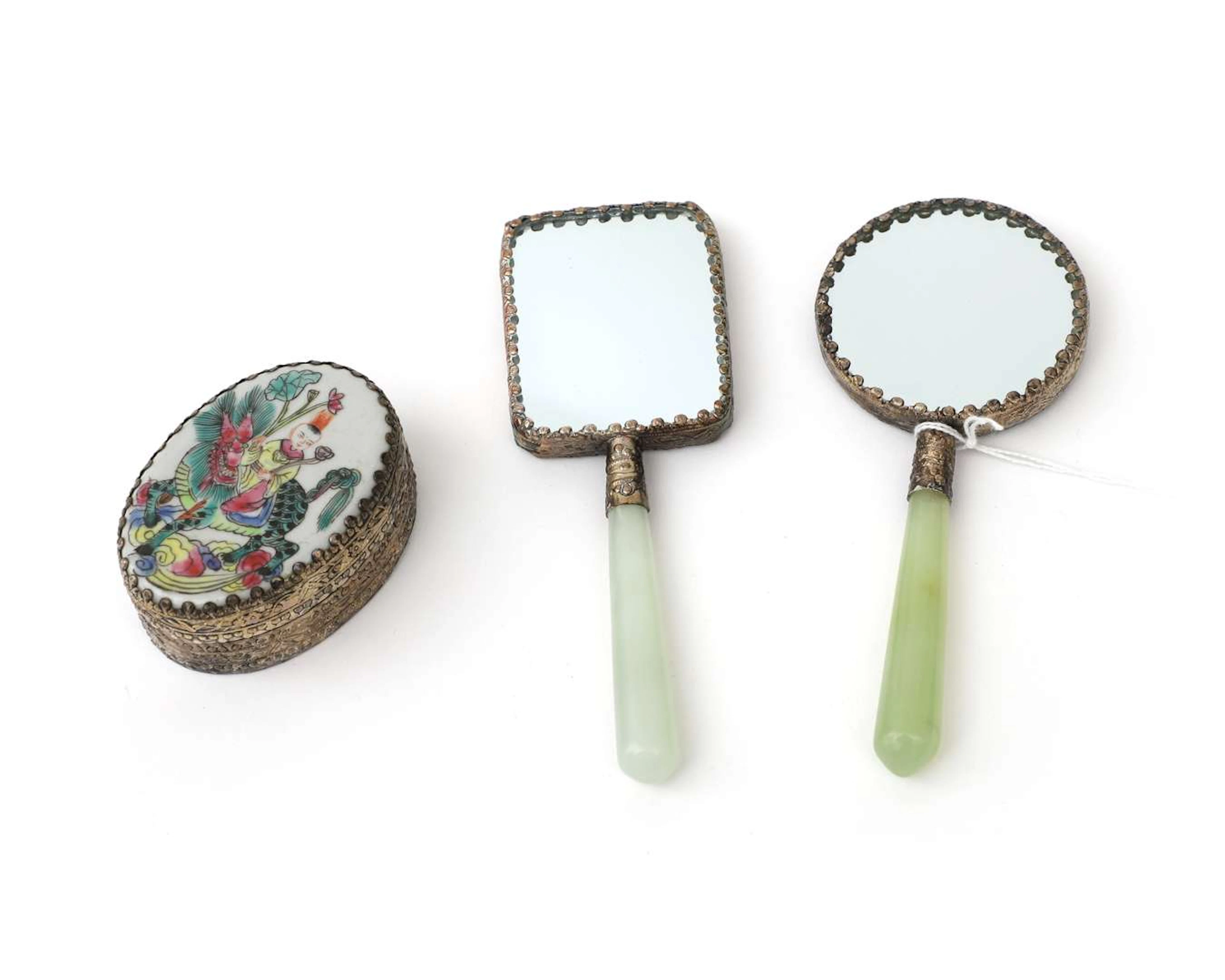 Two hand mirrors with jadeite handles and a mirror case, China, 20th century