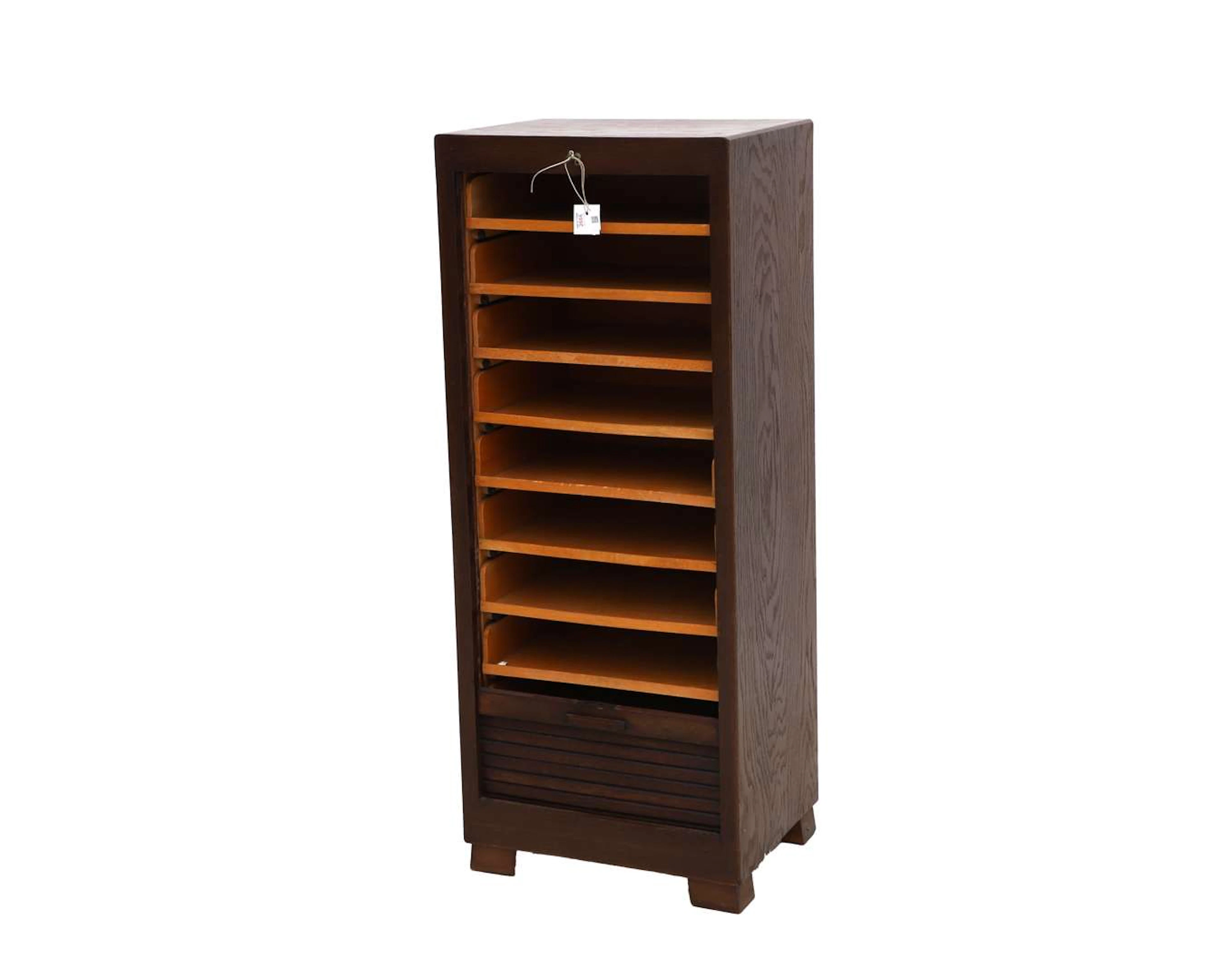 A filing cabinet with a louvred door, 20th century
