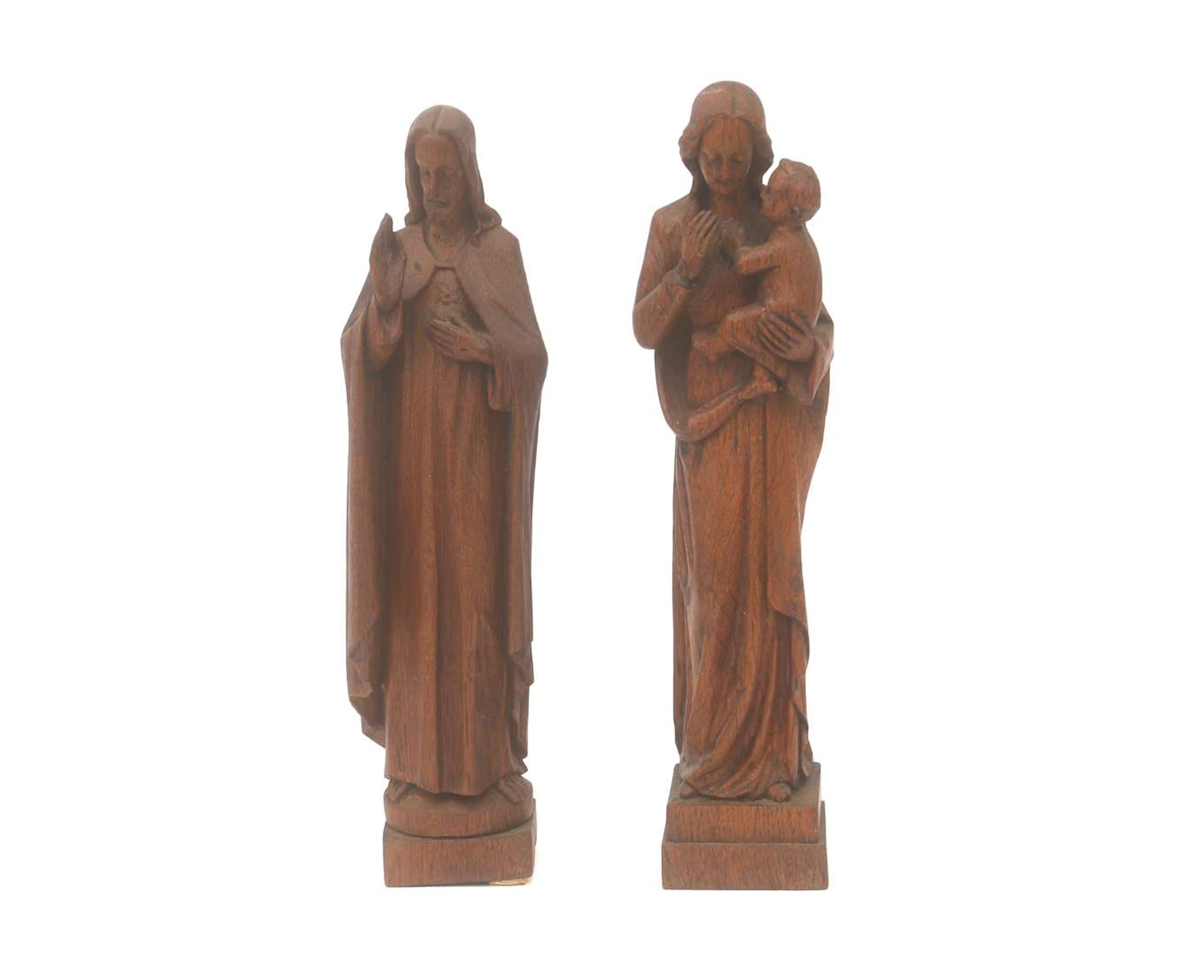 A wooden sculpture of Jesus and Mary with child, probably Hendrikus