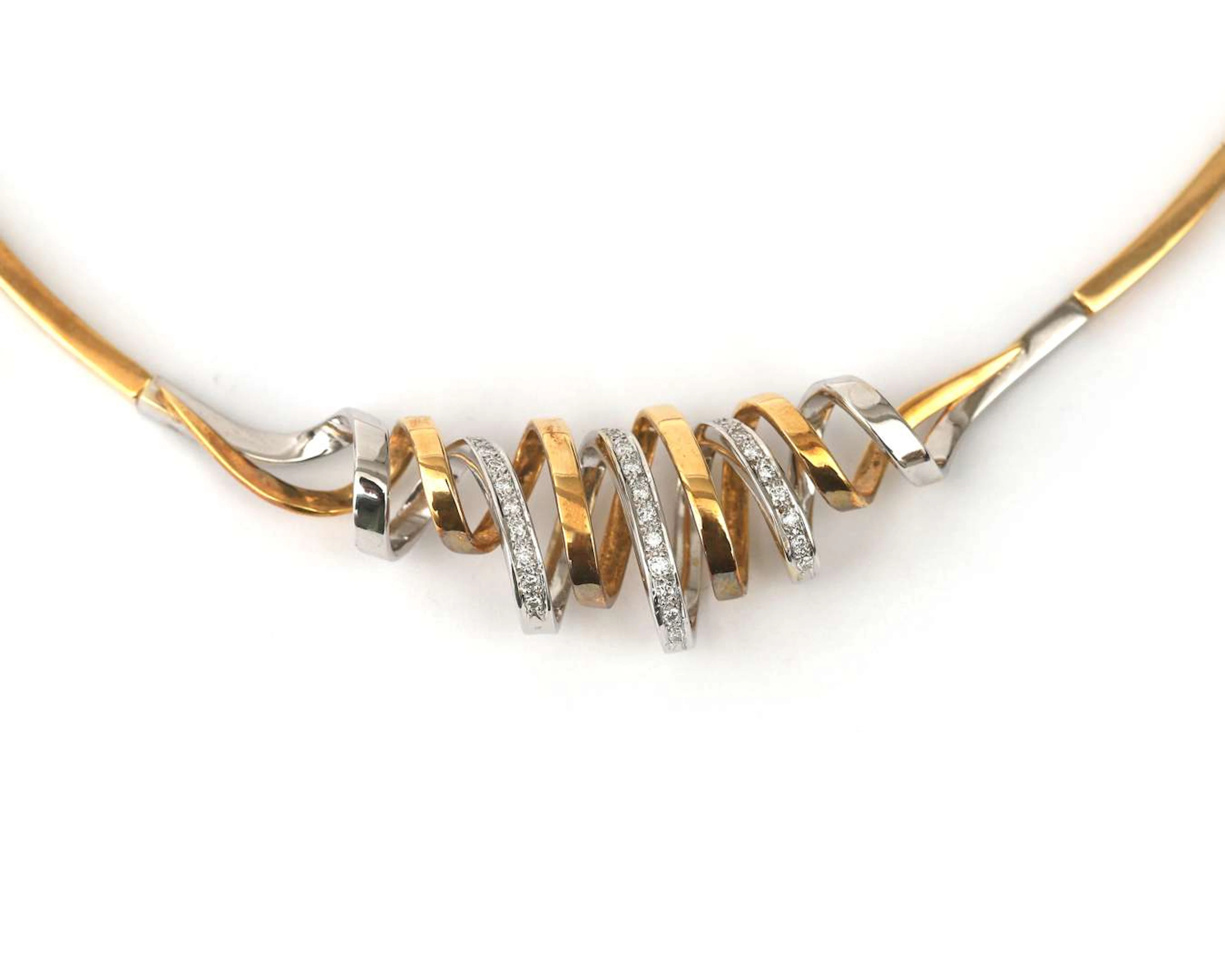 An 18-carat two-tone gold choker necklace and brooch set with a diamond