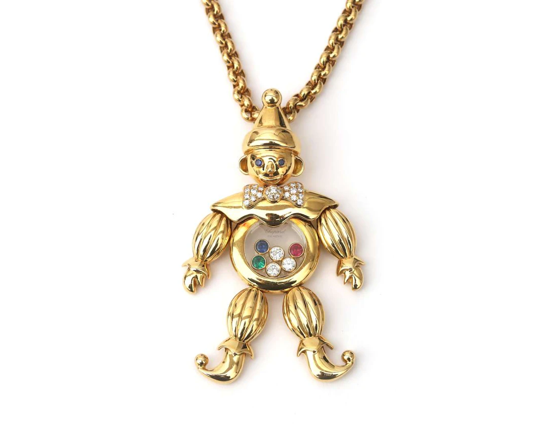 An 18-carat yellow gold Chopard Happy Clown pendant on a necklace, c. 1970