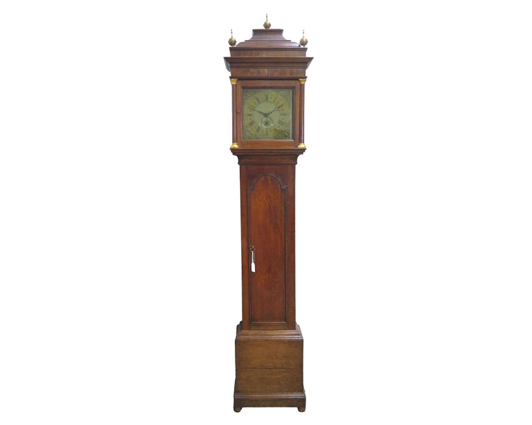 An oak grandfather clock. Made by Joseph Kirk, Nottingham, England