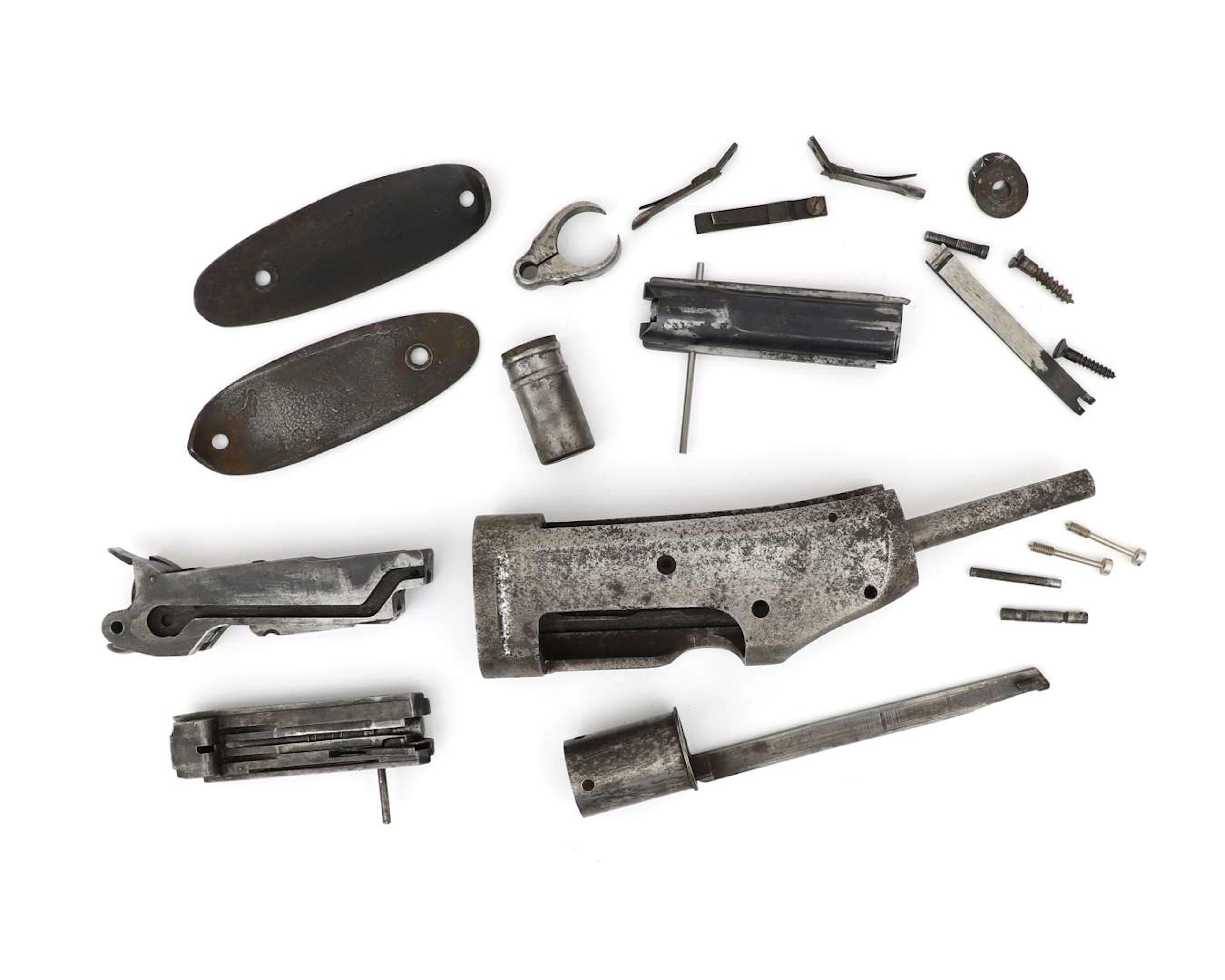 A set of parts for a slide-action rifle, Model 1893, manufactured