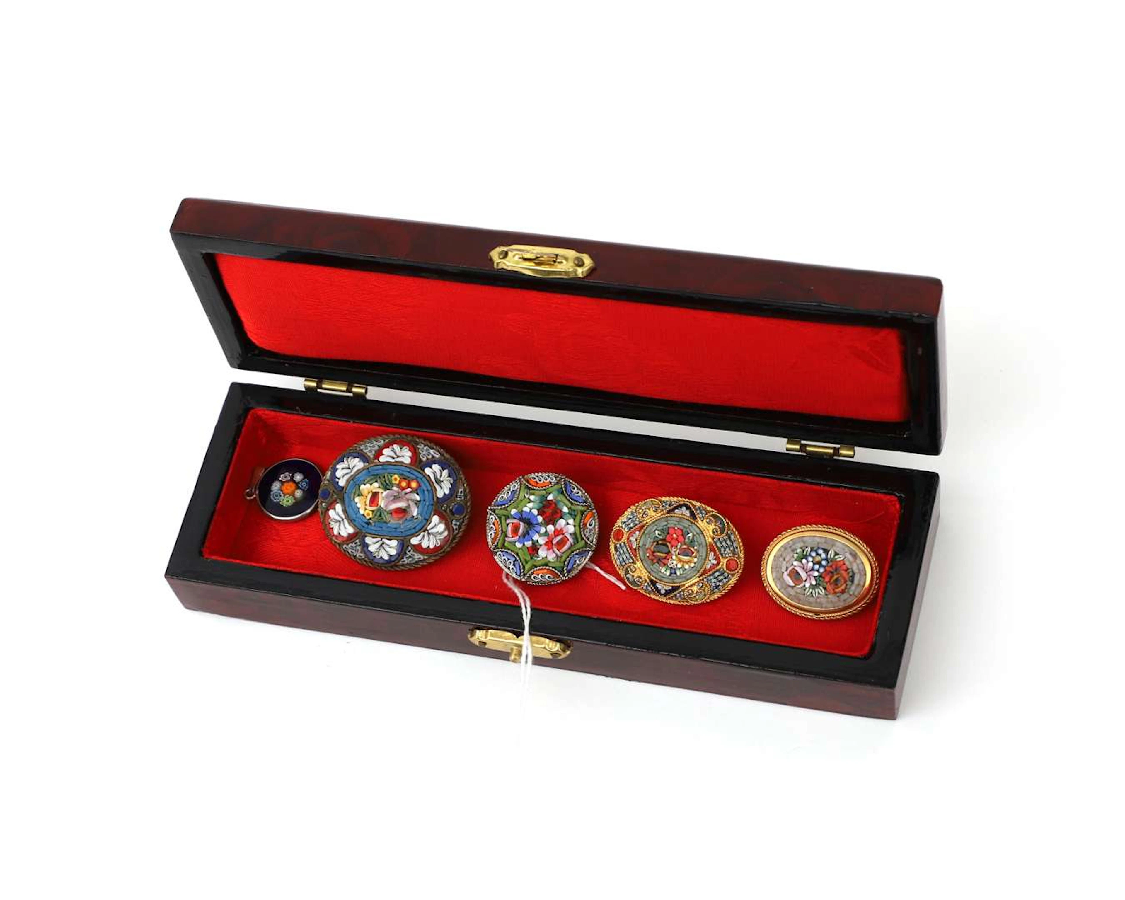 Four micro-mosaic brooches and a Millefiori pendant, Italy, 20th century