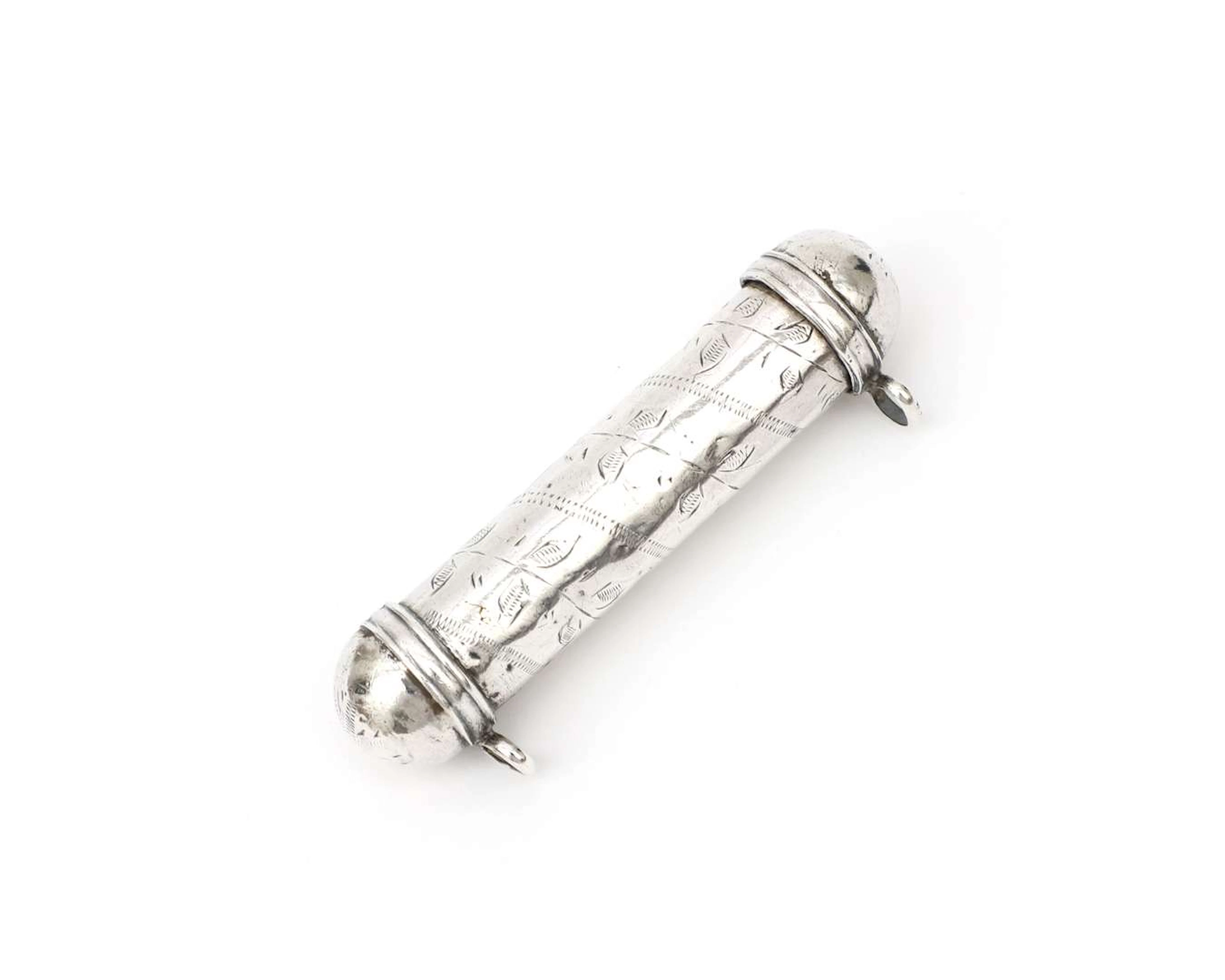 A silver document holder with an Arabic scroll, Middle East, 19th/20th century