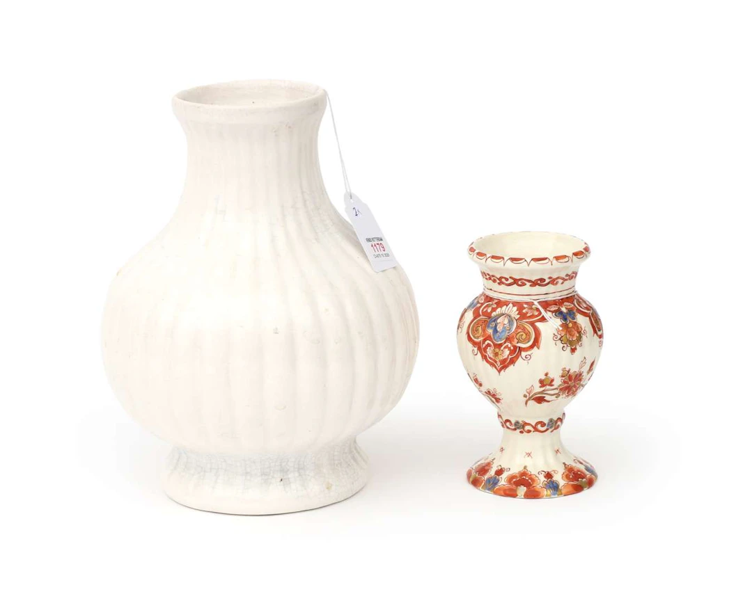 Two earthenware baluster vases, De Porceleyne Fles, Delft, Holland