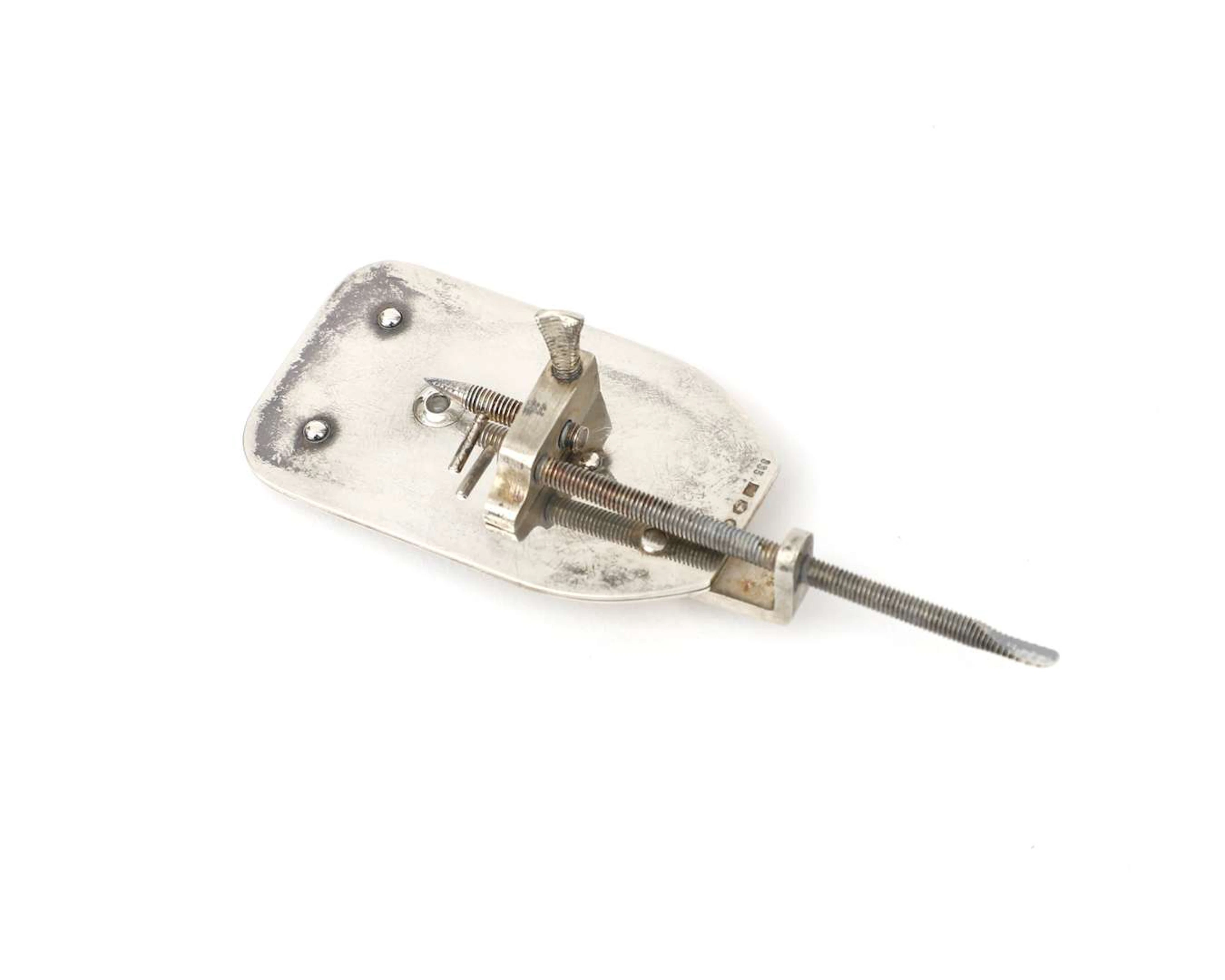 A silver replica of the Van Leeuwenhoek microscope, probably from