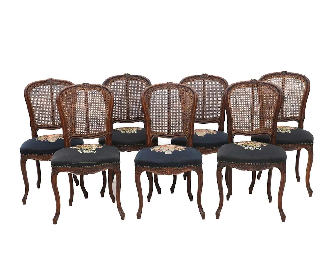 Seven dining chairs