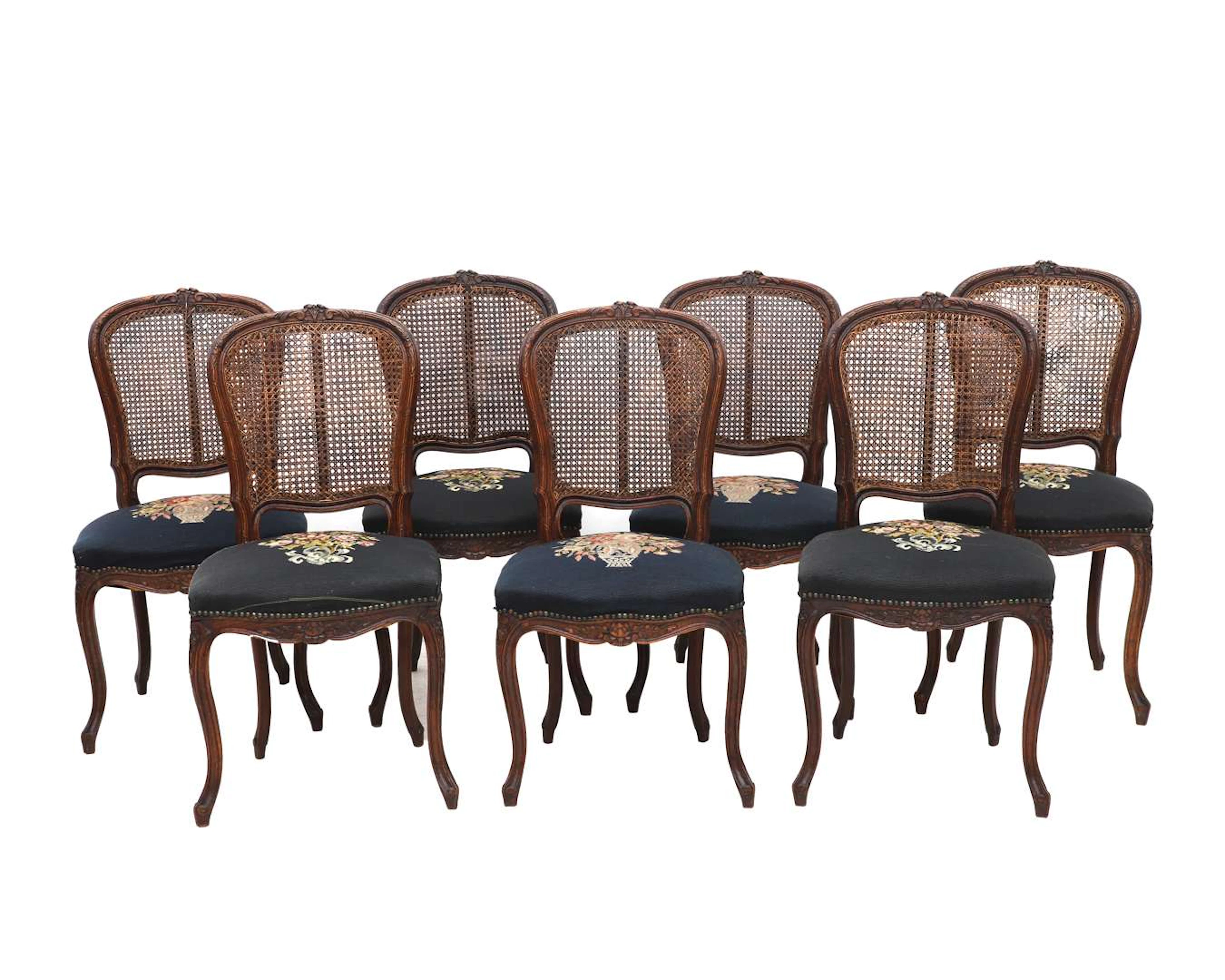 Seven dining chairs